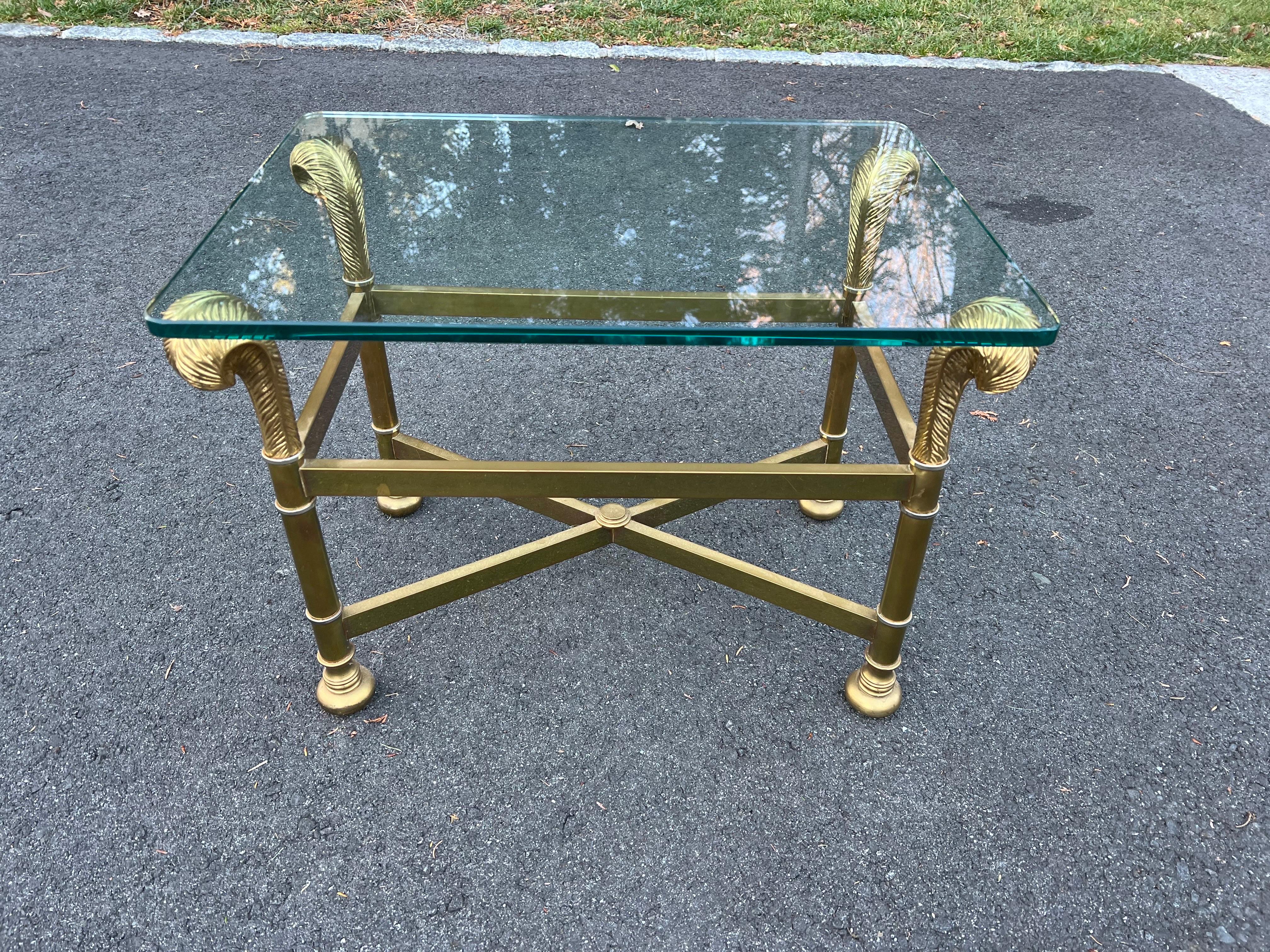 Hollywood Regency small low side table. This is a very elegant side table. It is very low and could also be turned into a cool ottoman or bed for a tiny dog. Very unique piece. The glass top piece is loose and not attached to the base.
