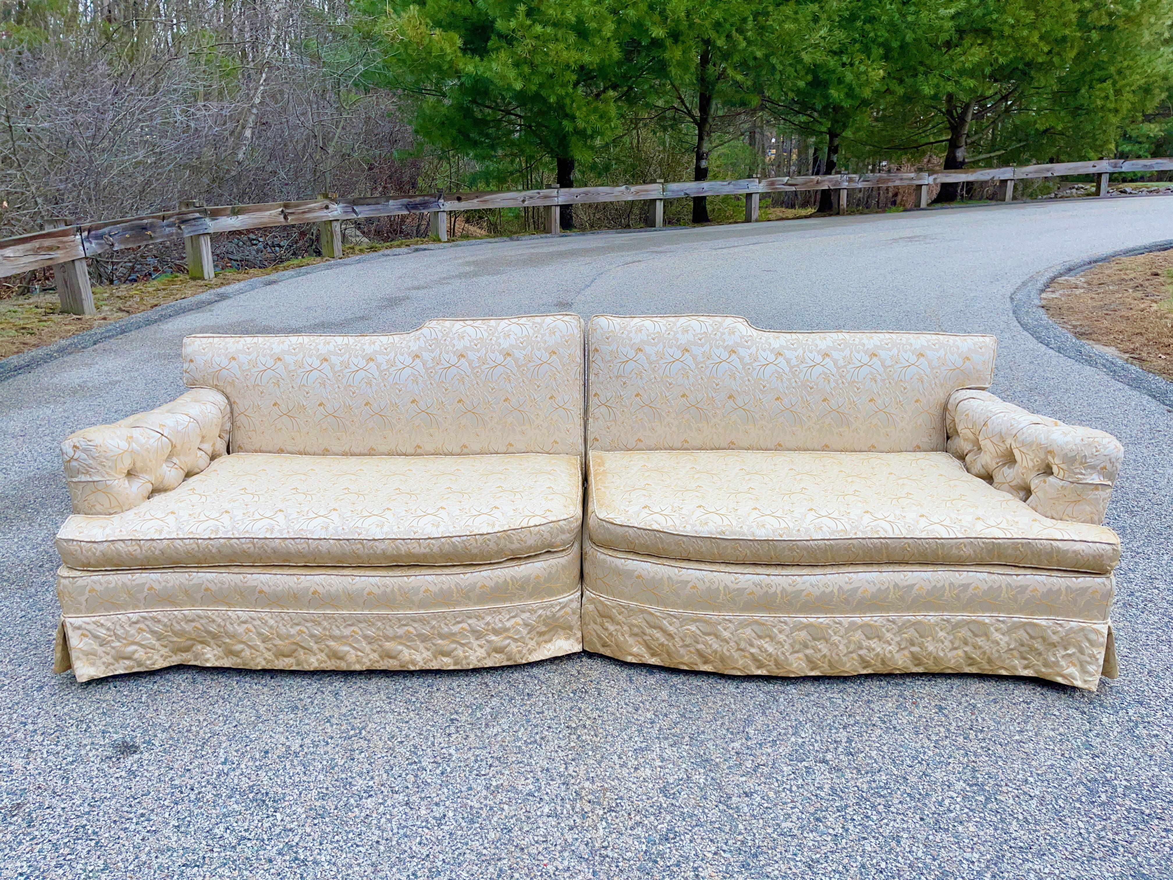 This custom made upholstered two piece sofa came from an outrageously over-the-top period Hollywood Regency decorated home outside of Boston. Think Zsa Zsa, Eva and Magda on steroids.
This fabric is embroidered gold thread on a shimmering platinum