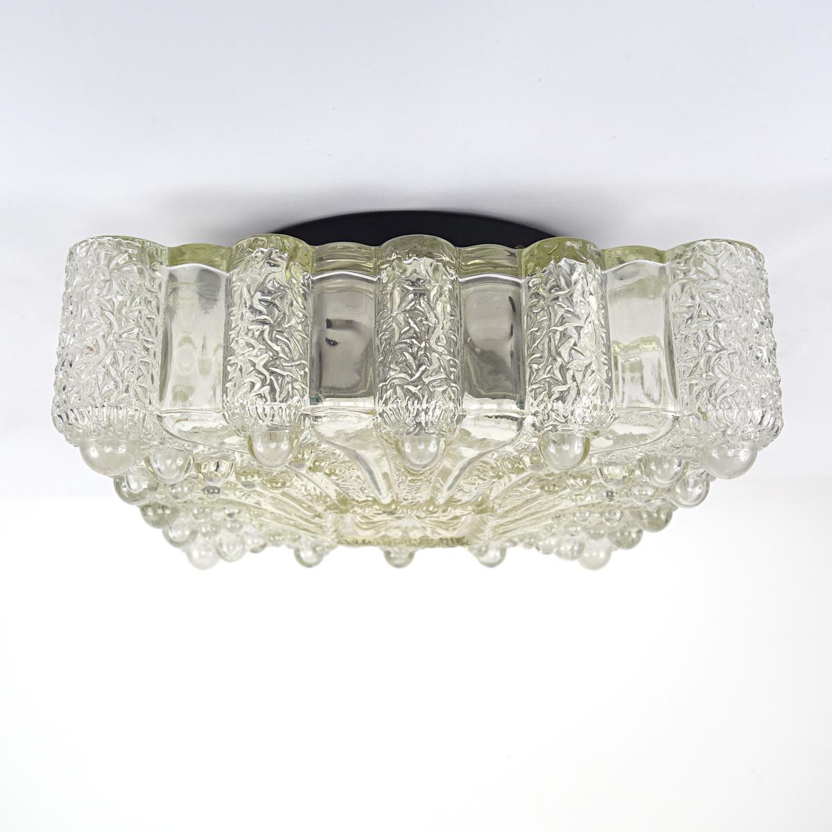 Very decorative square flushmount made of glass by German specialist RZB Leuchten.