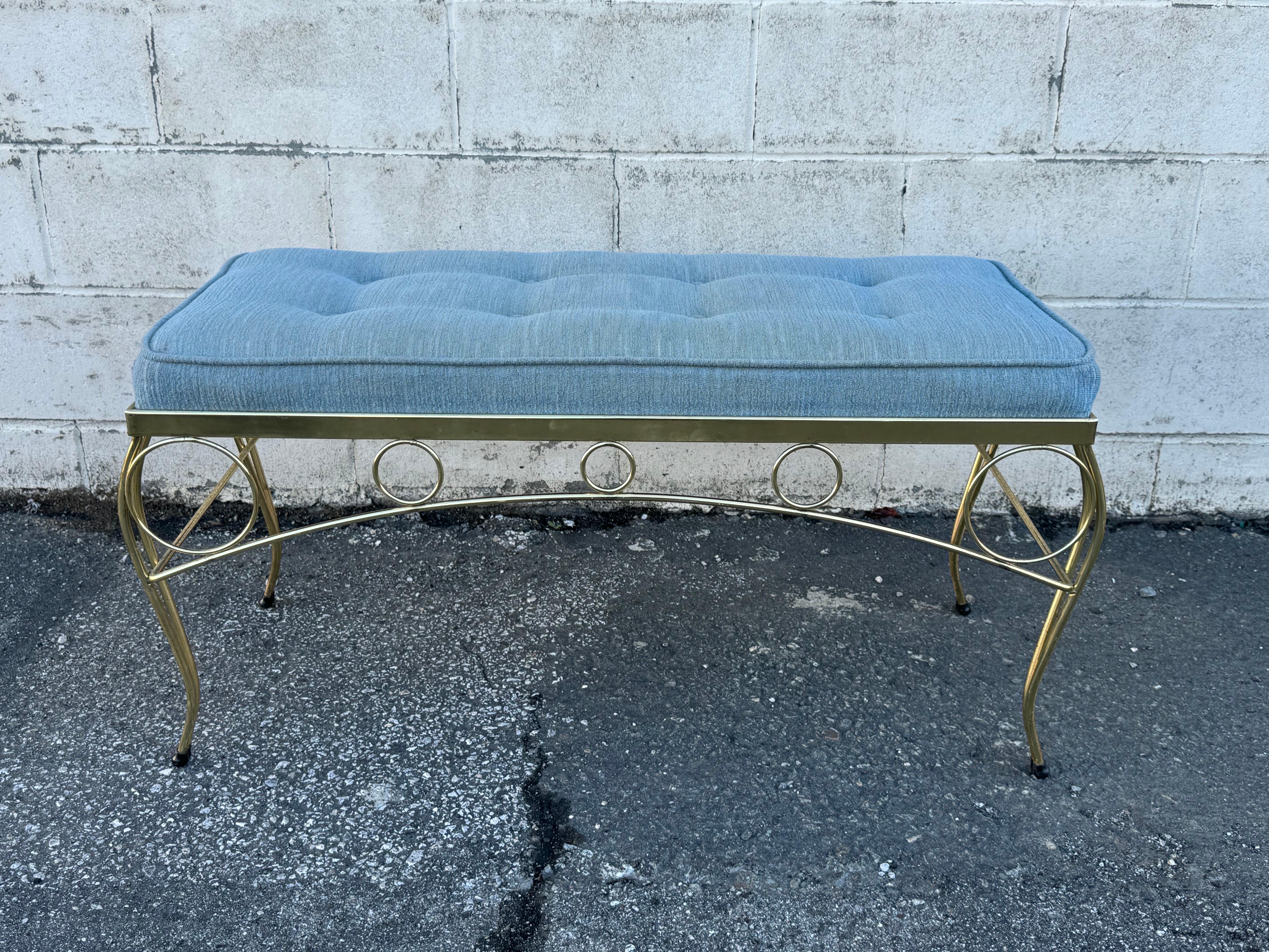 Great vintage, mid century bench after George Koch and Sons furniture. Comes on a strong metal, gilded frame with light blue upholstery.

Both frame and upholstery are in very good structural shape, but both come with age appropriate wear. the gold