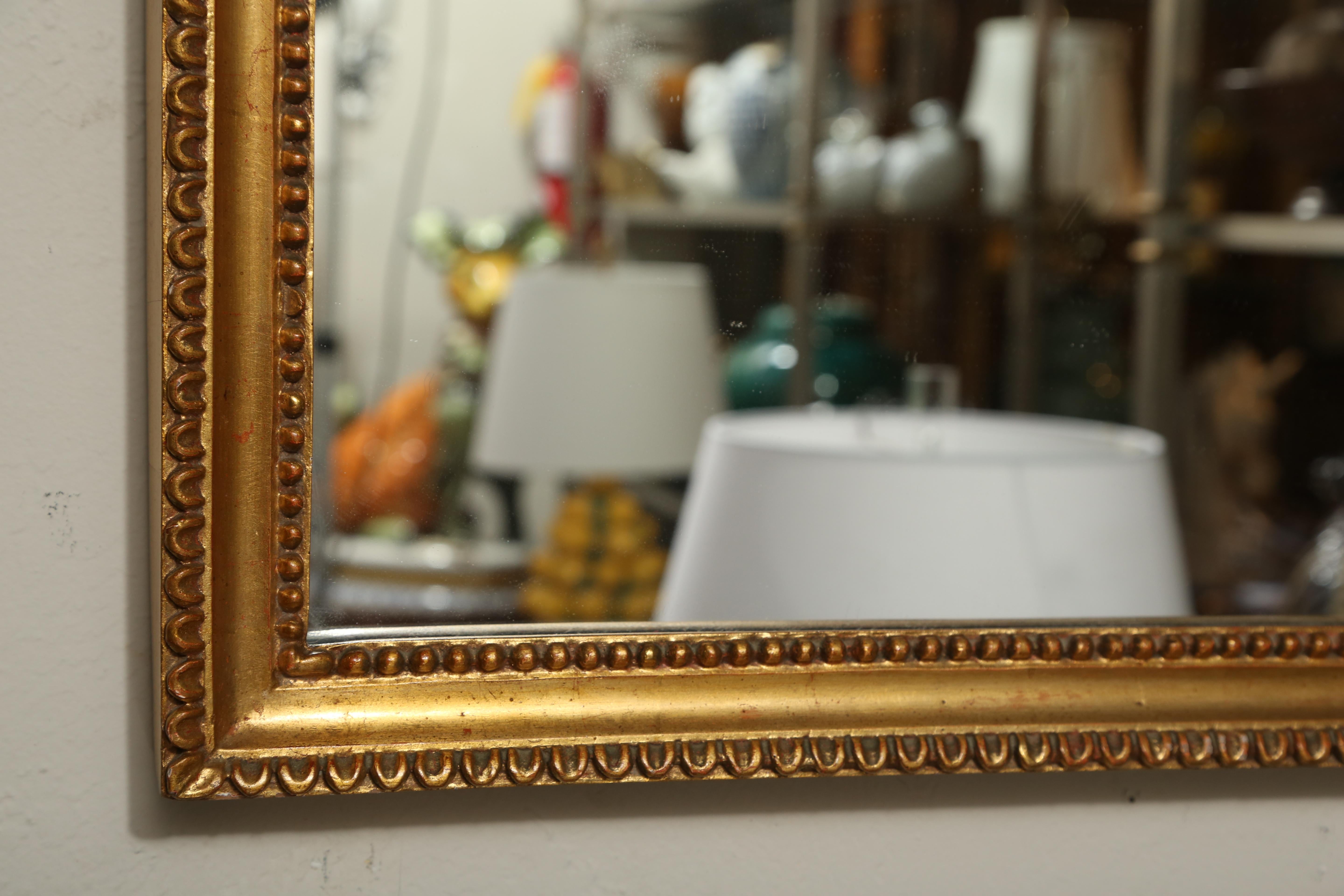 Italian Hollywood Regency Style Carved and Gilded Swag Mirror