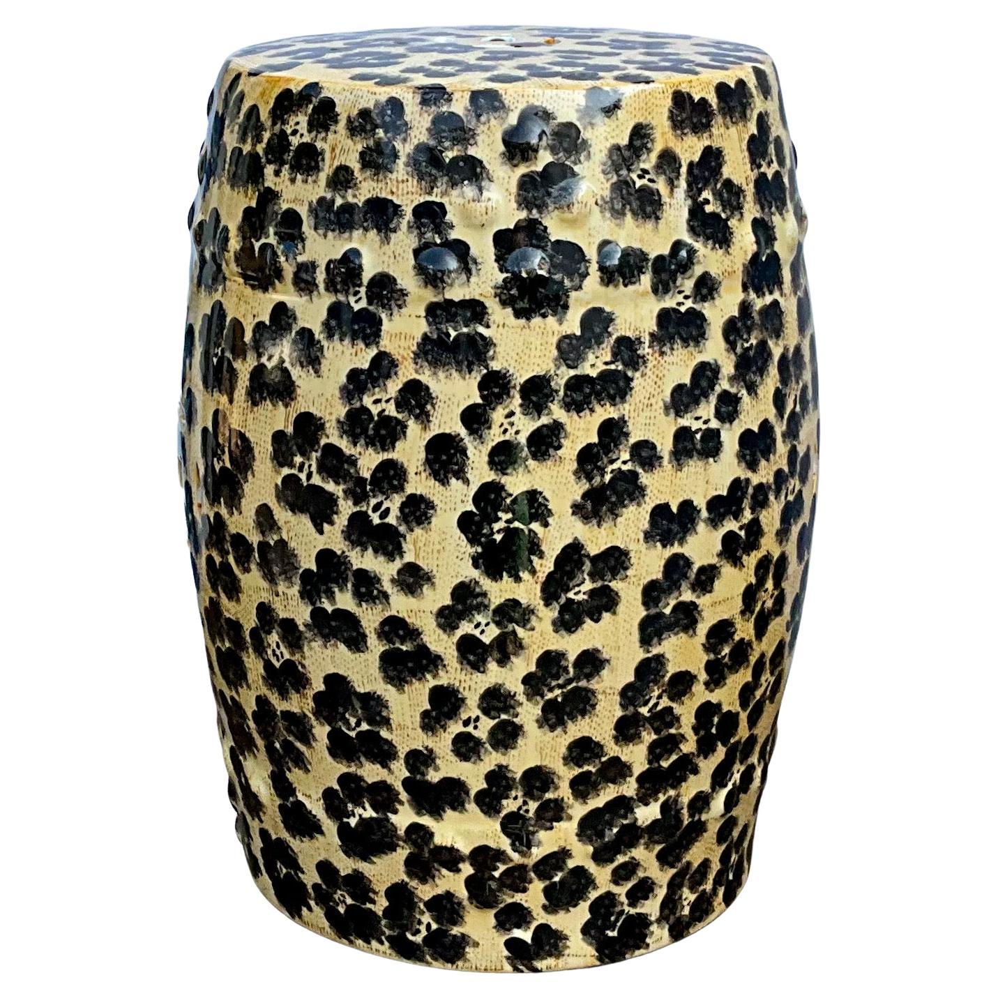 This is a fun accent piece! This is a ceramic leopard garden stool or side table. It is not terribly old and in perfect condition.