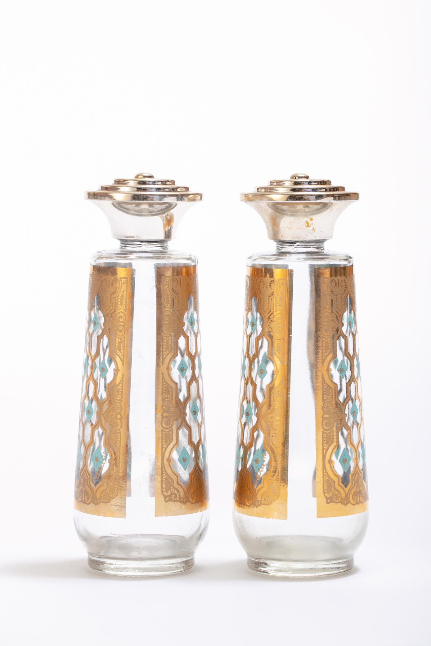 Culver LTD Mid-Century Modern, atomic style glass salt and pepper shakers featuring 22-karat gold Sevilla pattern on the glass. The lids are made of chrome-toned painted plastic and are in good vintage condition. Want to see more beautiful things?