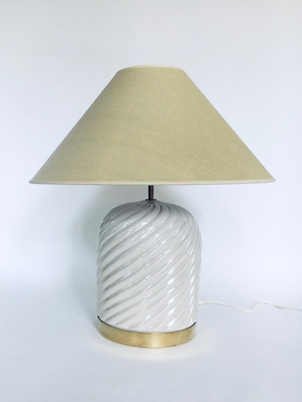 Vintage Postmodern Hollywood Regency Style Italian Design Table Lamp Set by Tommaso Barbi, made in Italy 1970's. Ceramichi, Ceramic base with brass trim table or side board lamp set of 2 with all new lampshades. Whipcream twisted ceramic base in a