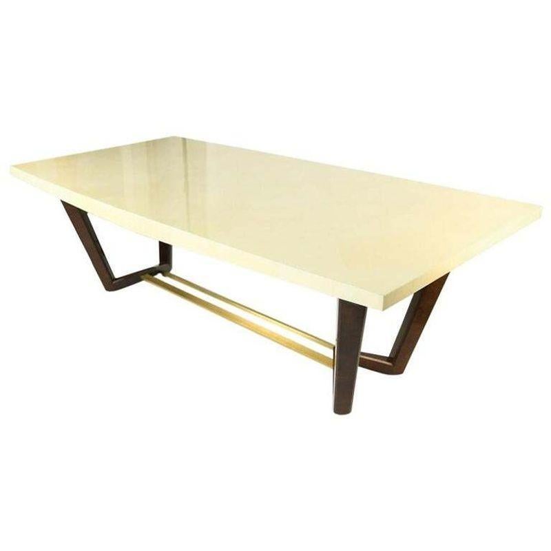 Lorin Marsh Design Sawhorse Dining Table or Conference Table
 
Shown here in a bleached parchment and mahogany base with brushed-brass stretcher. This stunning dining, center or conference table is sure to add sparkle to any room in the home or