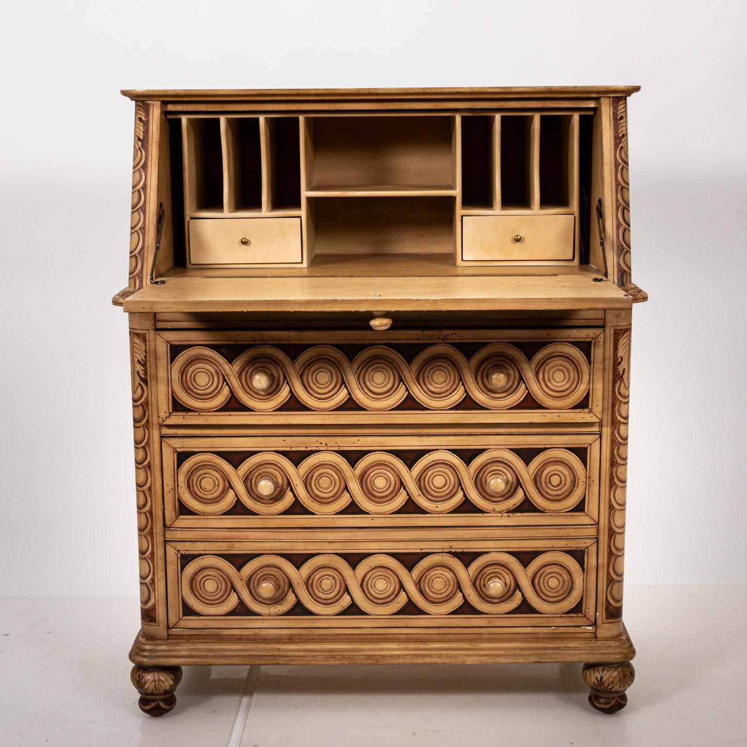 Faux painted drop front desk with three drawers circa late 20th century . The piece is decorated with Neoclassical motifs and also fitted with cubbies and drawers inside. Please note of wear consistent with age including surface holes in the wood.