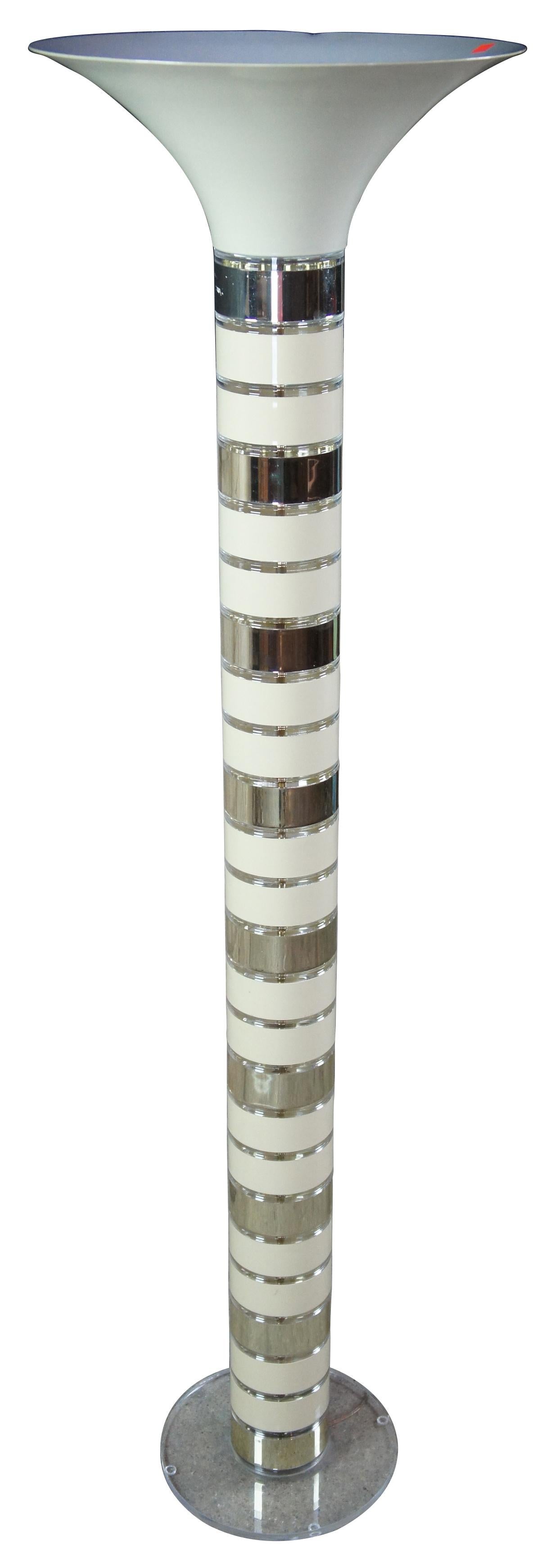 Vintage Hollywood Regency style floor lamp. Features a stacked design with enamel and banding. Measure: 67