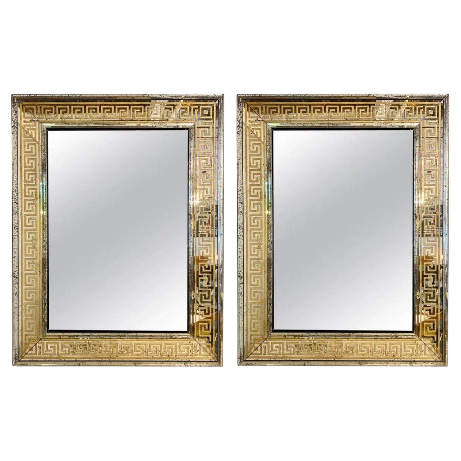 Miroirs muraux de style régence hollywoodienne, en verre gravé et doré, à clé grecque, États-Unis, 21e s.