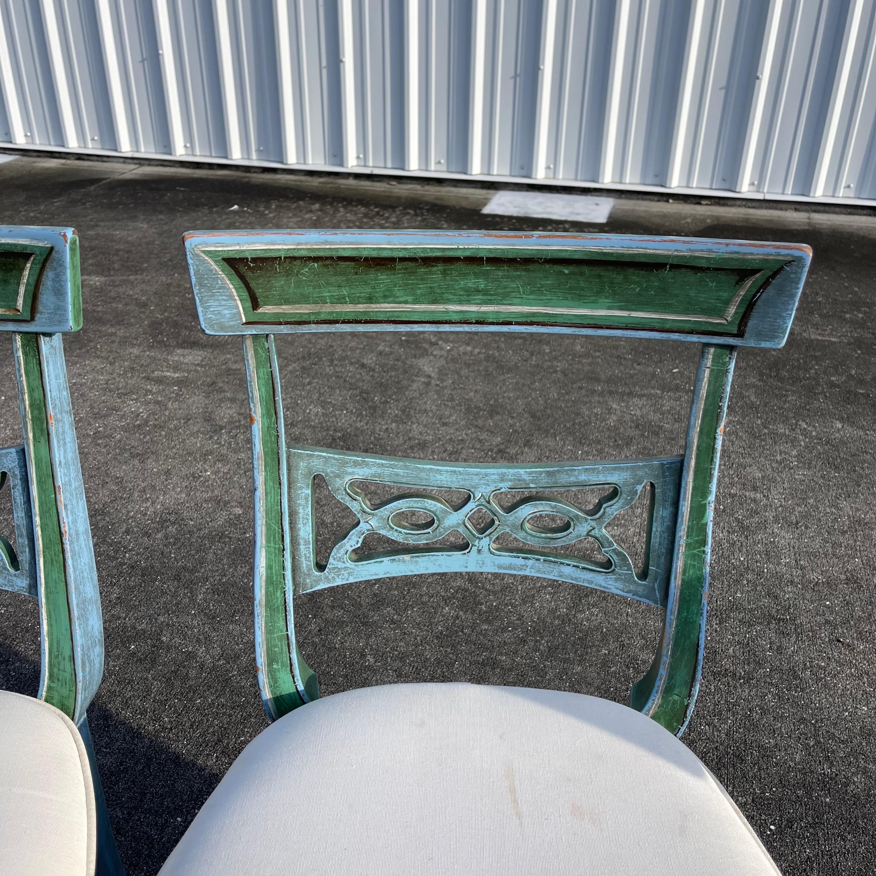 Fabulous set of painted wood chairs.