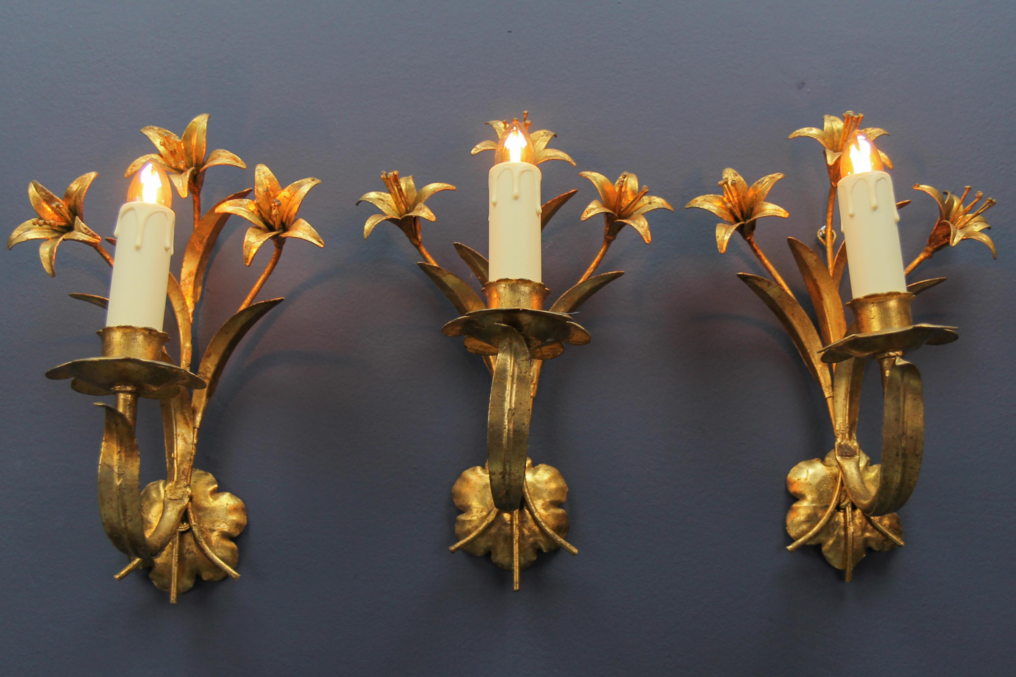 Mid-20th Century Hollywood Regency Style French Gilt Metal Lily Flower Wall Sconces, Set of Three