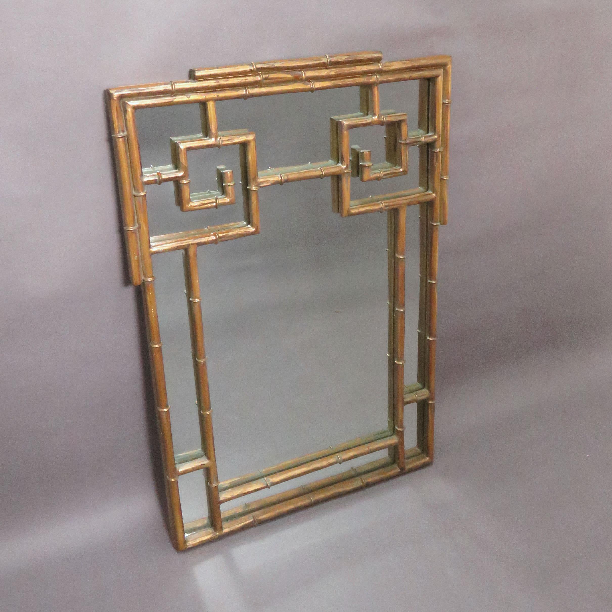 Gilded faux bamboo mirror in the Chinese Chippendale manner with wonderful patina, circa 1950s.