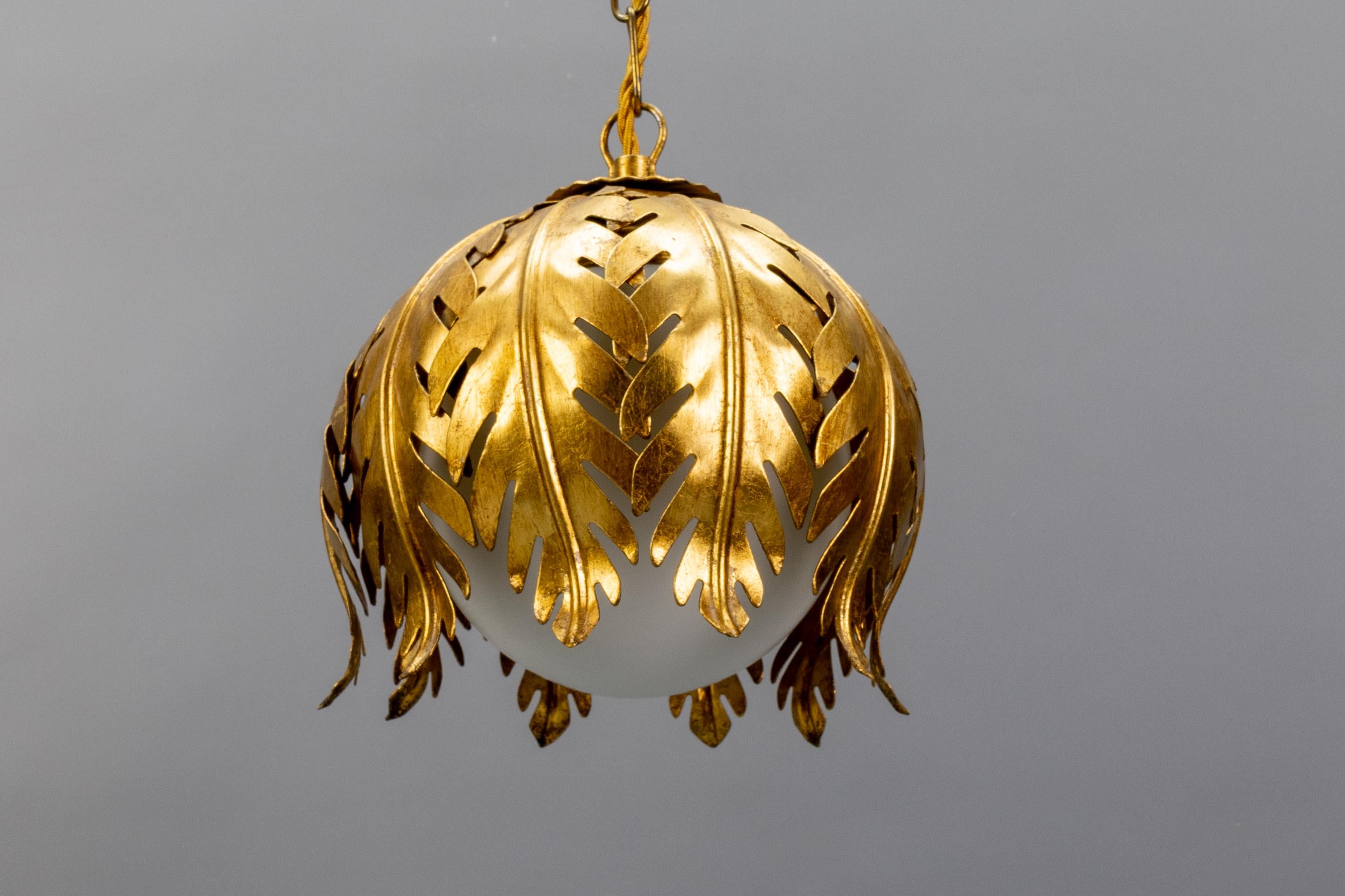German Hollywood Regency Style Gilt Metal and White Glass Floral Leaf Pendant Light For Sale