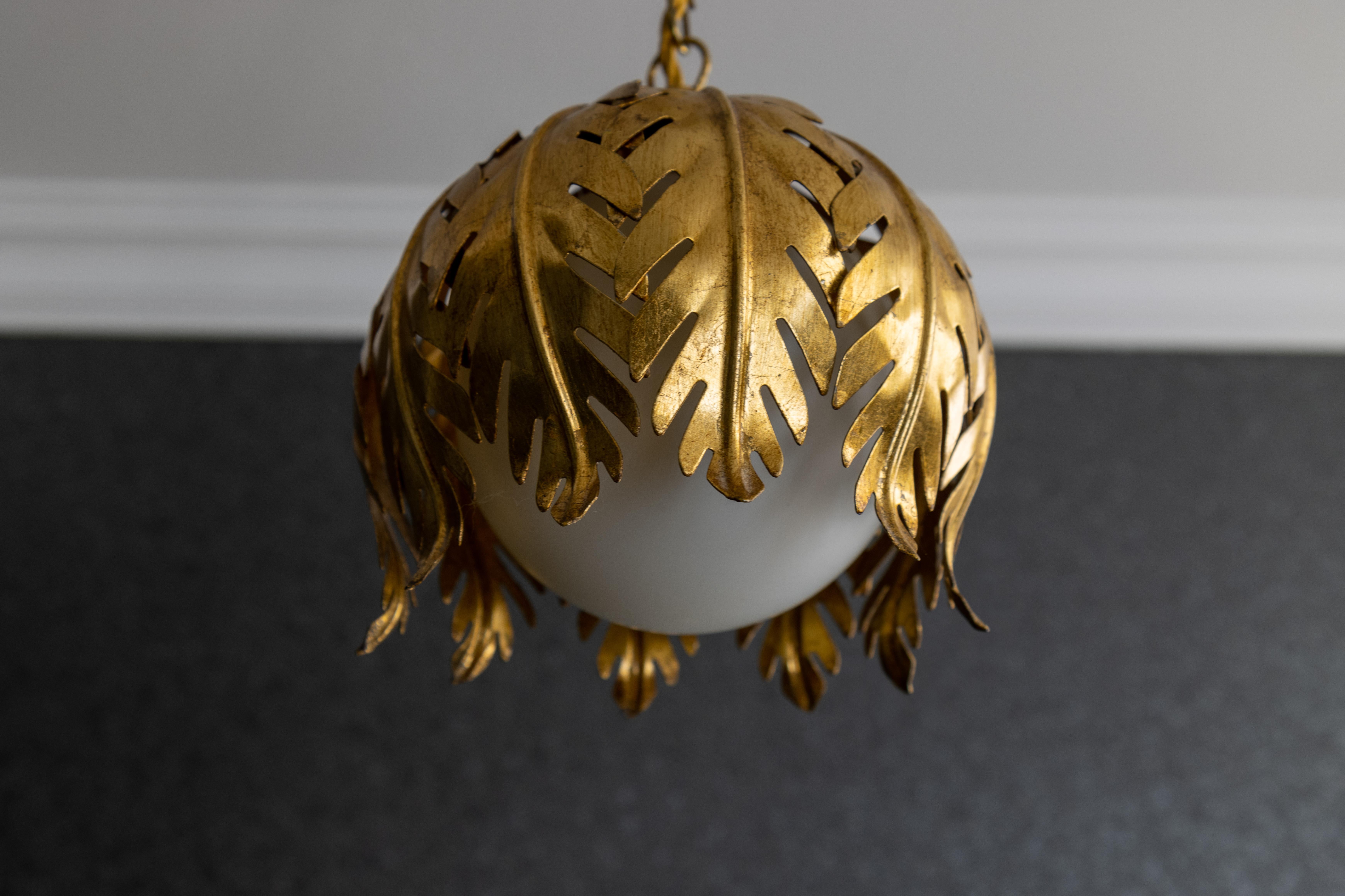 Mid-20th Century Hollywood Regency Style Gilt Metal and White Glass Floral Leaf Pendant Light For Sale