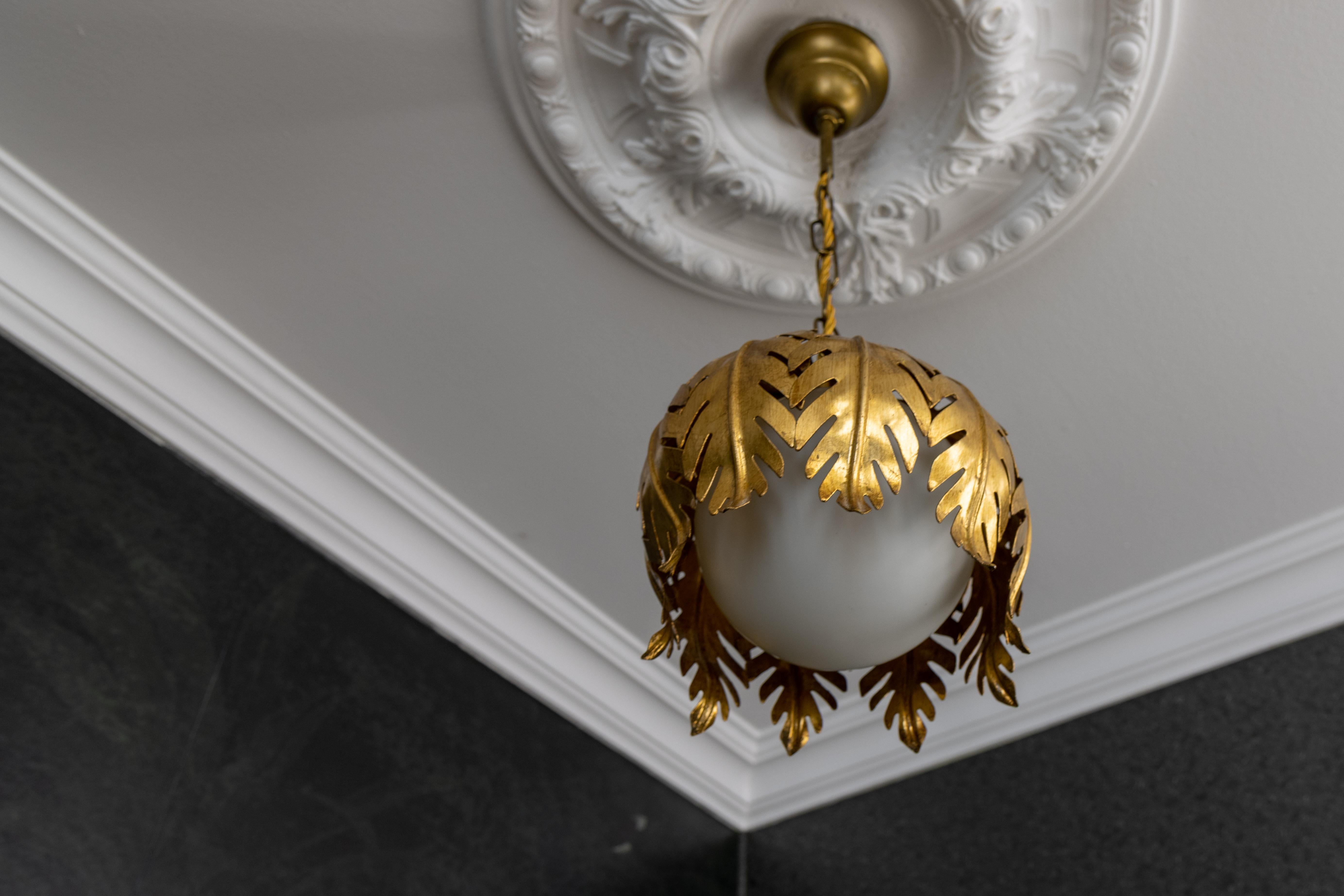 Hollywood Regency Style Gilt Metal and White Glass Floral Leaf Pendant Light For Sale 4