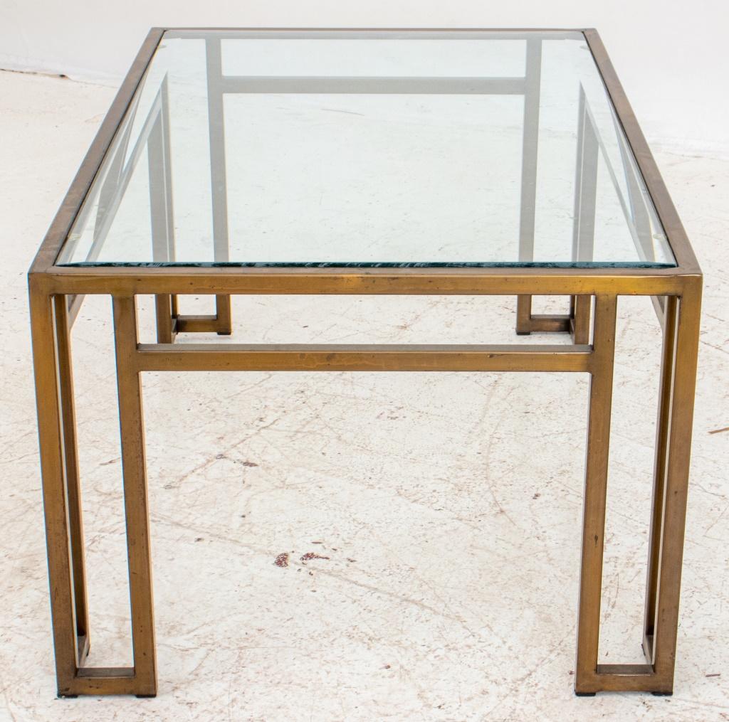 Hollywood Regency style gilt metal coffee table with non-original glass top. 16