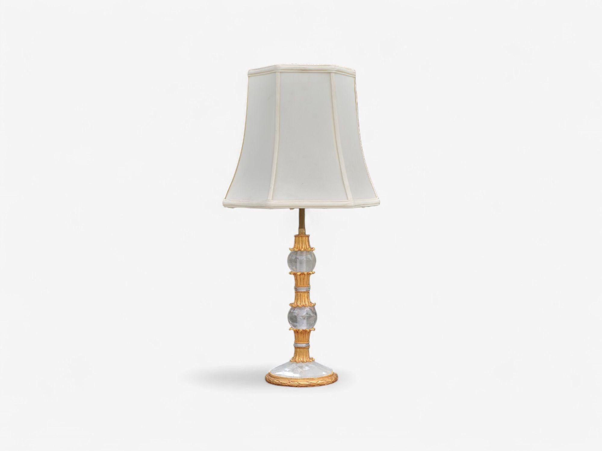 Hollywood Regency Style, Gilt Metal, Rock Crystal, Table Lamps, France, 1940s

Pair of gilt metal and rock crystal Baguès style table lamps. Each having been recently rewired and with custom lamp shades. This stunning pair acquired directly from a