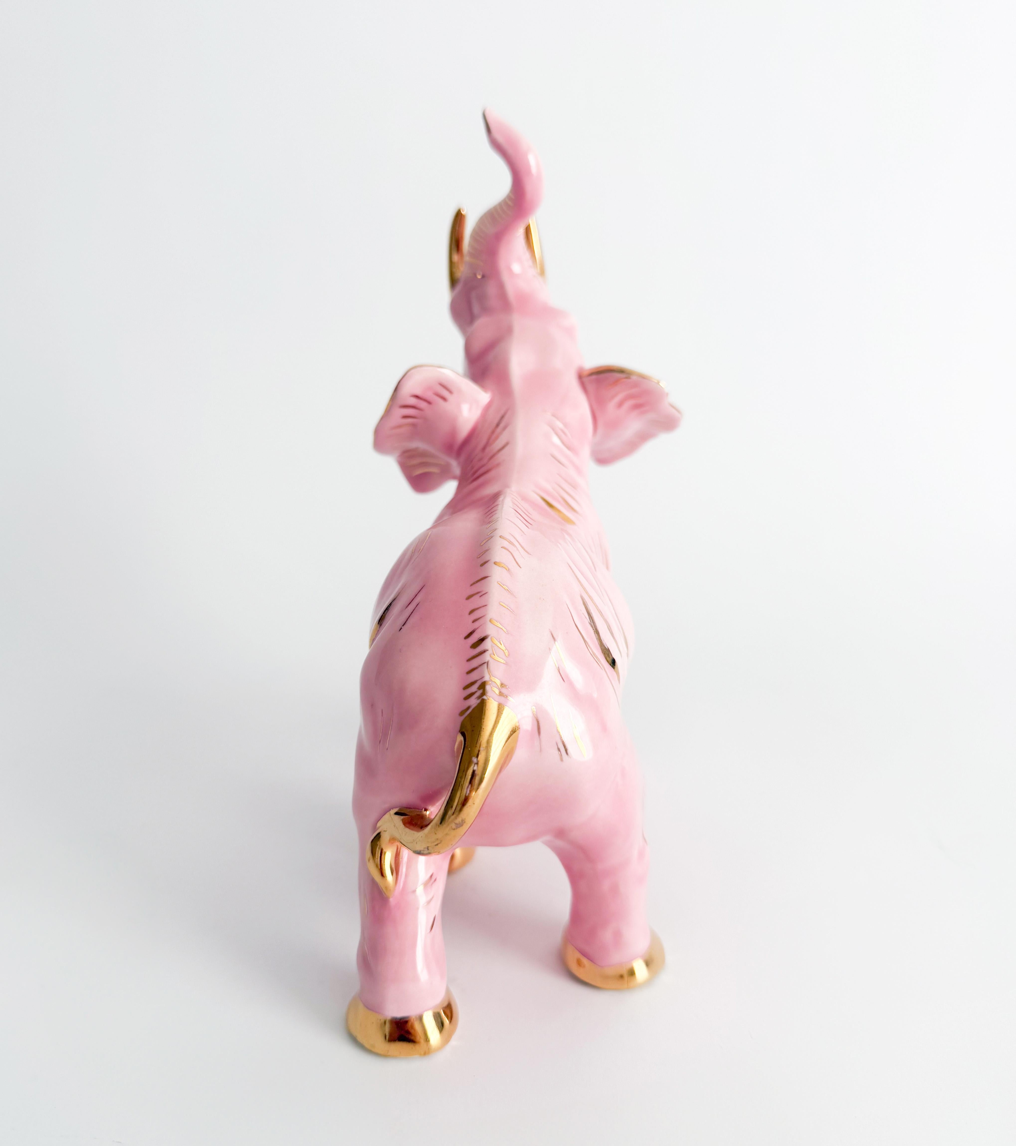 Ceramica Figurina di elefante in stile Hollywood Regency in oro e rosa lucido in vendita