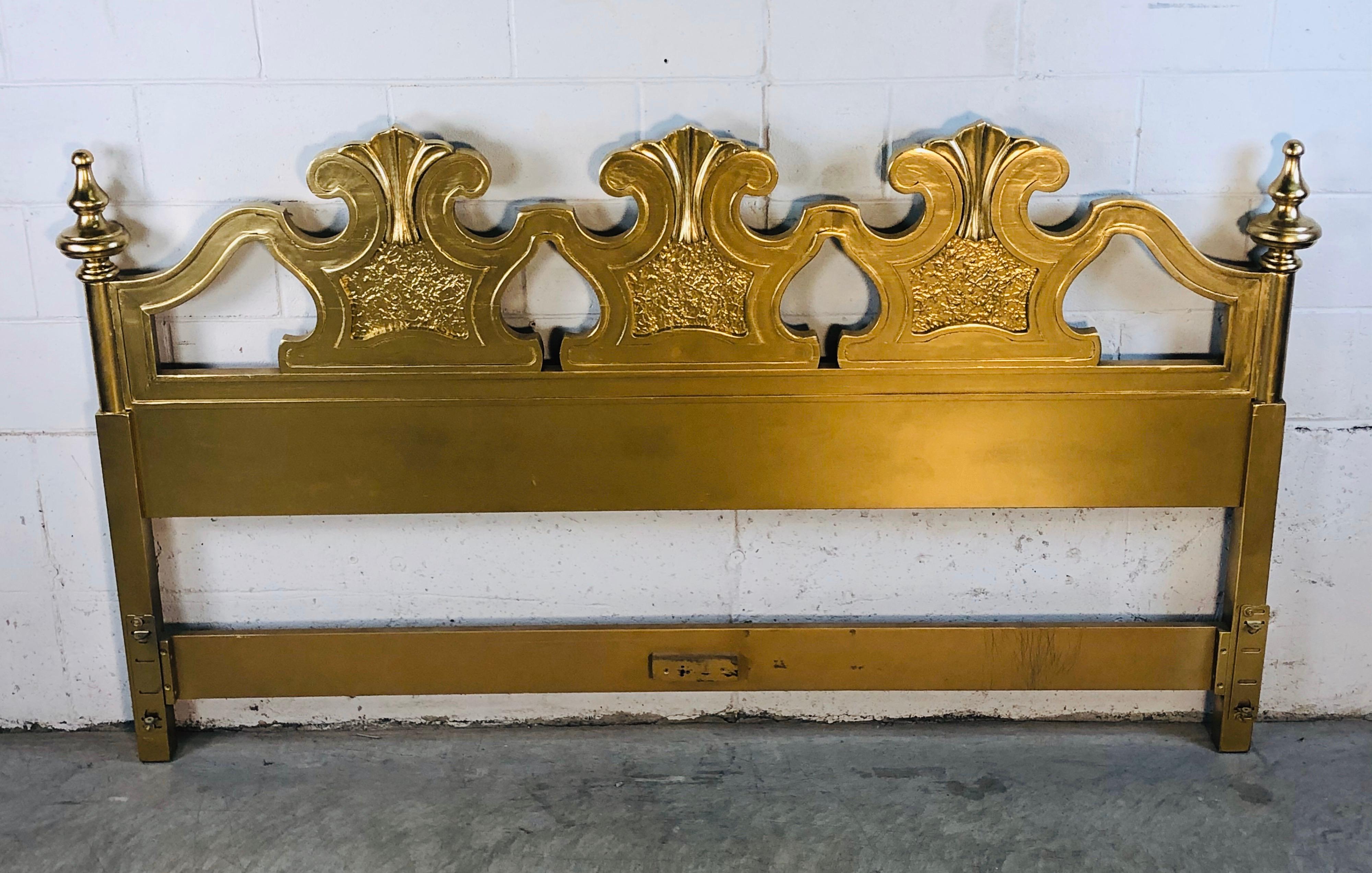 Hollywood Regency style gold painted wood king size headboard. The headboard has been newly repainted and has lots of interesting detail. Rail holes are 77” apart. No marks.