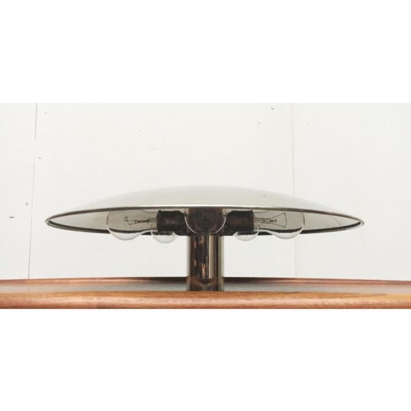 Simple ceiling or wall luminaire from the renowned luminaire manufacturer Florian Schulz.

The design convinces with its simple elegance. A simple bowl with a reflective surface that sits under the ceiling or on the wall. The light exits indirectly