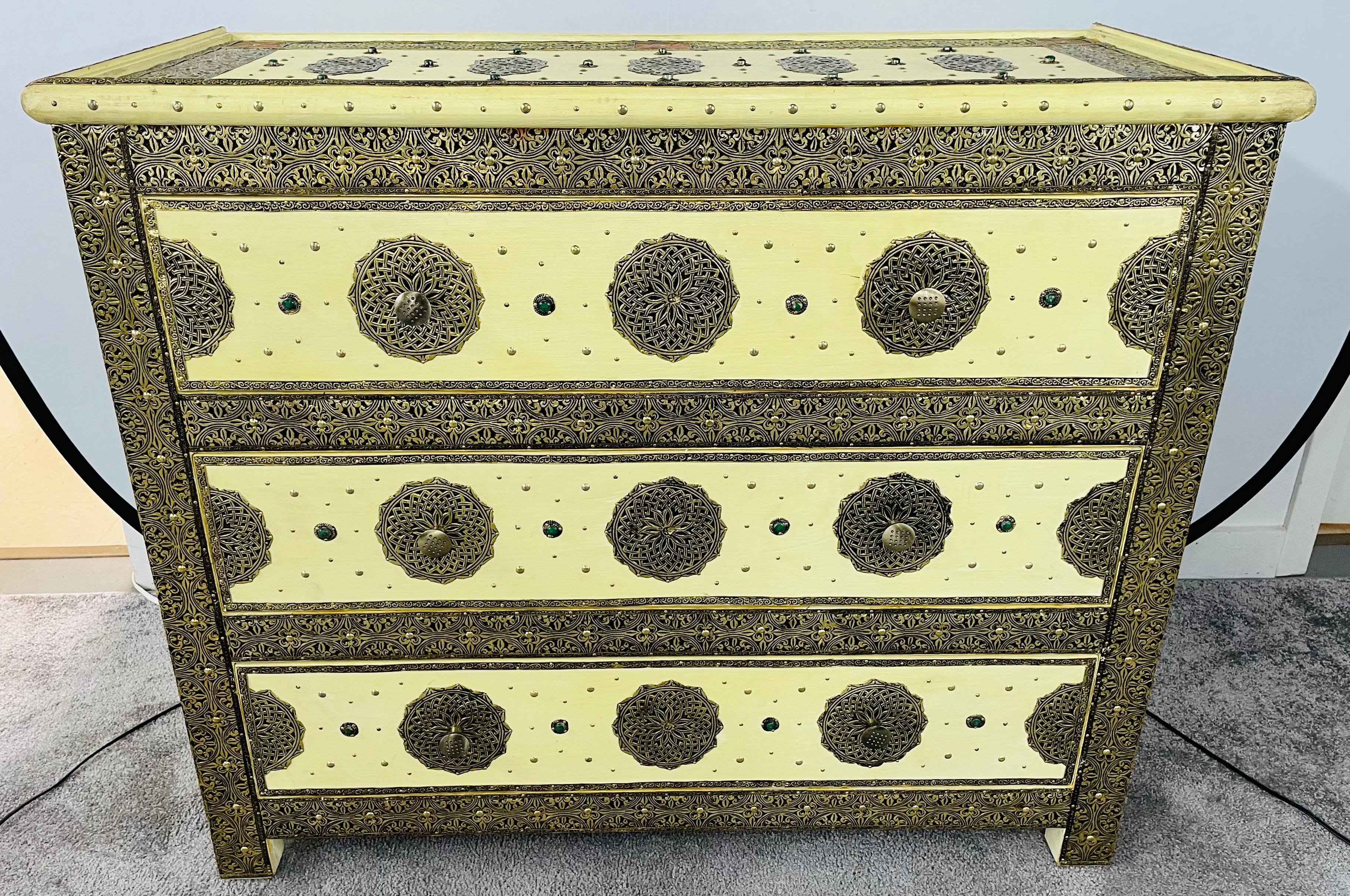 An opulent pair of Hollywood regency style commodes, chests or nightstands. These exceptional chests depict and compliment the Hollywood Regency era at its finest. Each featuring amazing intricate latticework on silver-toned metal and brass and