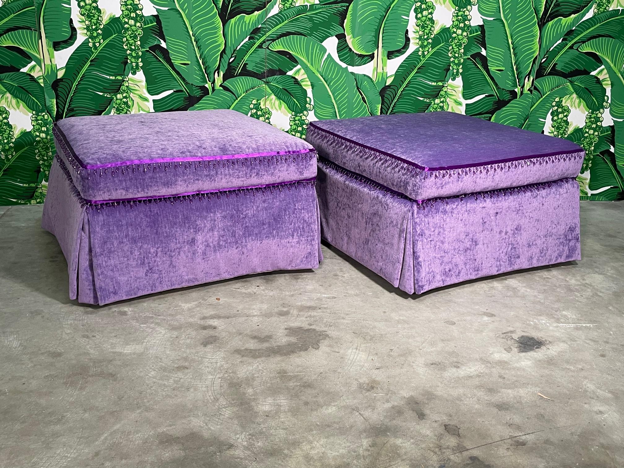 Pair of Hollywood Regency style ottomans upholstered in a soft, velvet like fabric. Very good condition with minor imperfections consistent with age. May exhibit scuffs, marks, or wear, see photos for details.
For a shipping quote to your exact zip