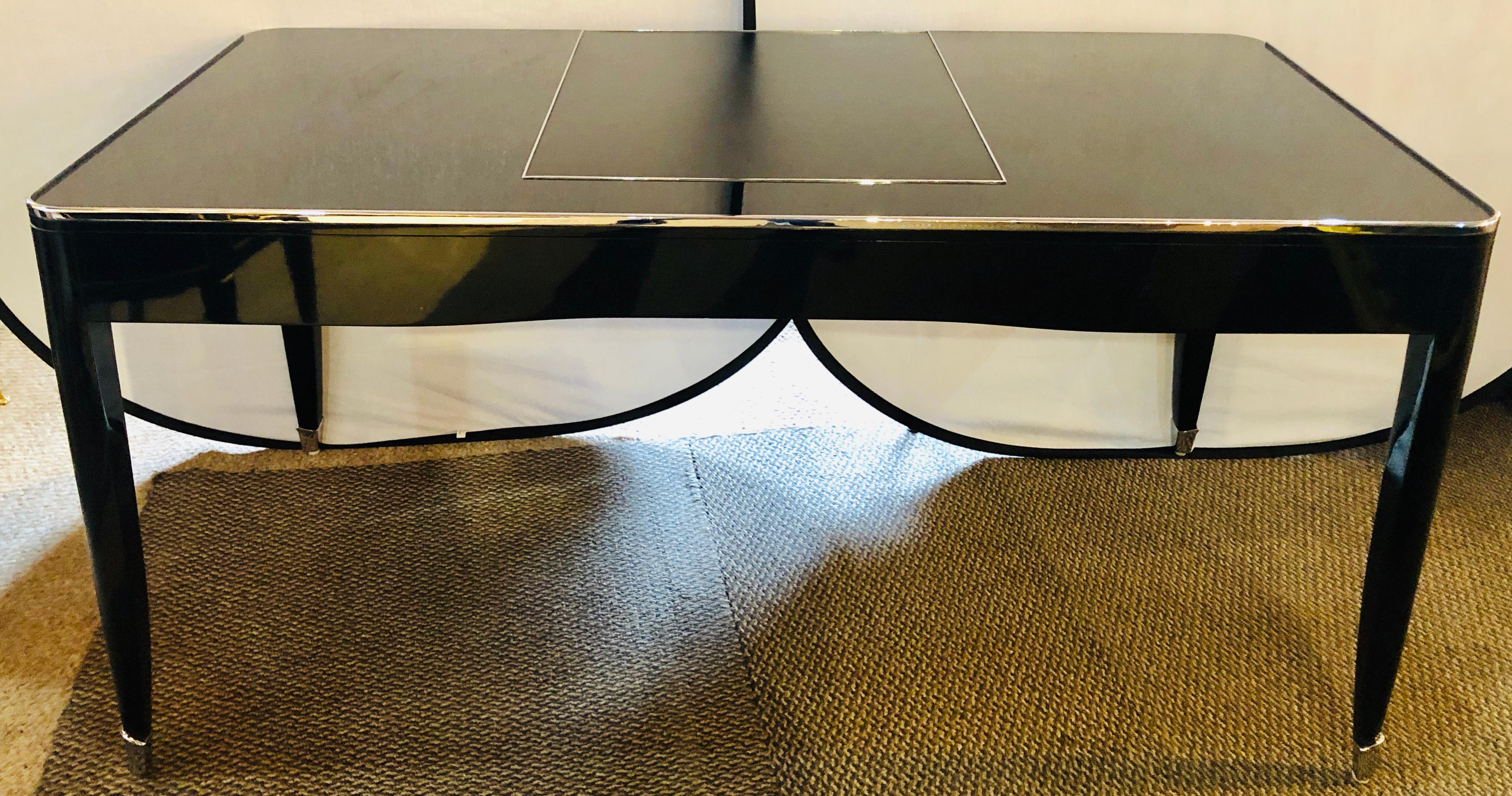 One fifth Paris desk by Ralph Lauren-black lacquered with chrome accents. Stamped Ralph Lauren an ebony and chrome top desk. Brand new! Retails at $14,000 with a long waiting time for production.