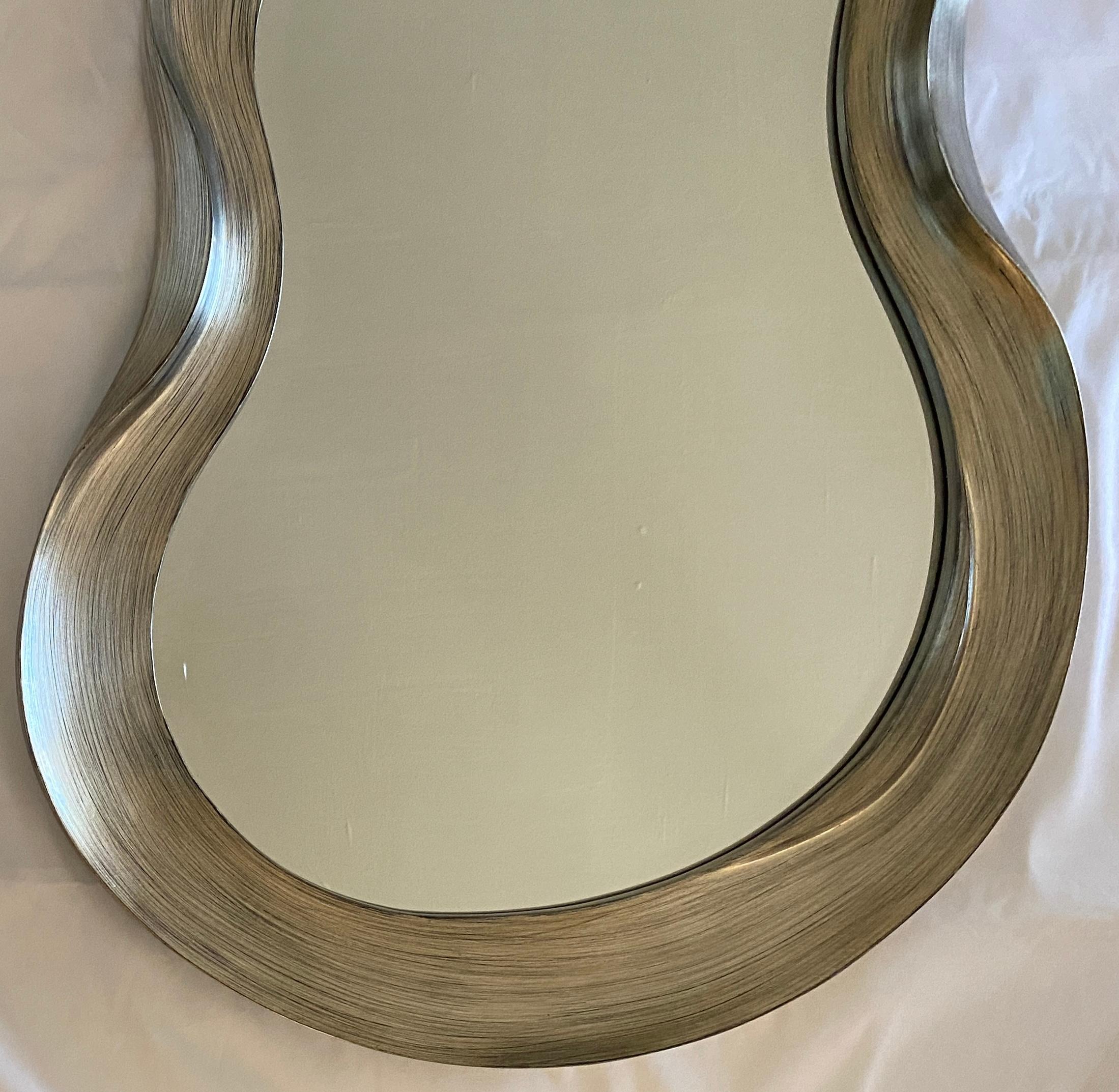 Contemporary Hollywood Regency Style Curved Silvered Mirror For Sale
