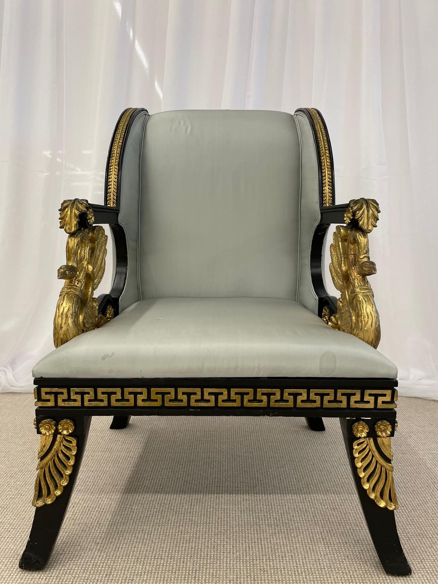 Hollywood Regency style throne, lounge, chair

A fine ebonized and parcel gilt decorated throne or lounge chair having Greek key design. The arm rests supported by wonderfully carved, full-bodied, winged Swan.