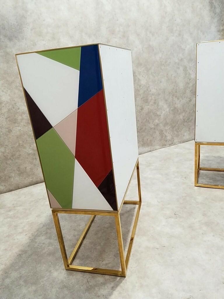 Hollywood Regency Styled Torino Glass and Brass Cabinet by Jonathan Adler - Pair In Good Condition In Chicago, IL