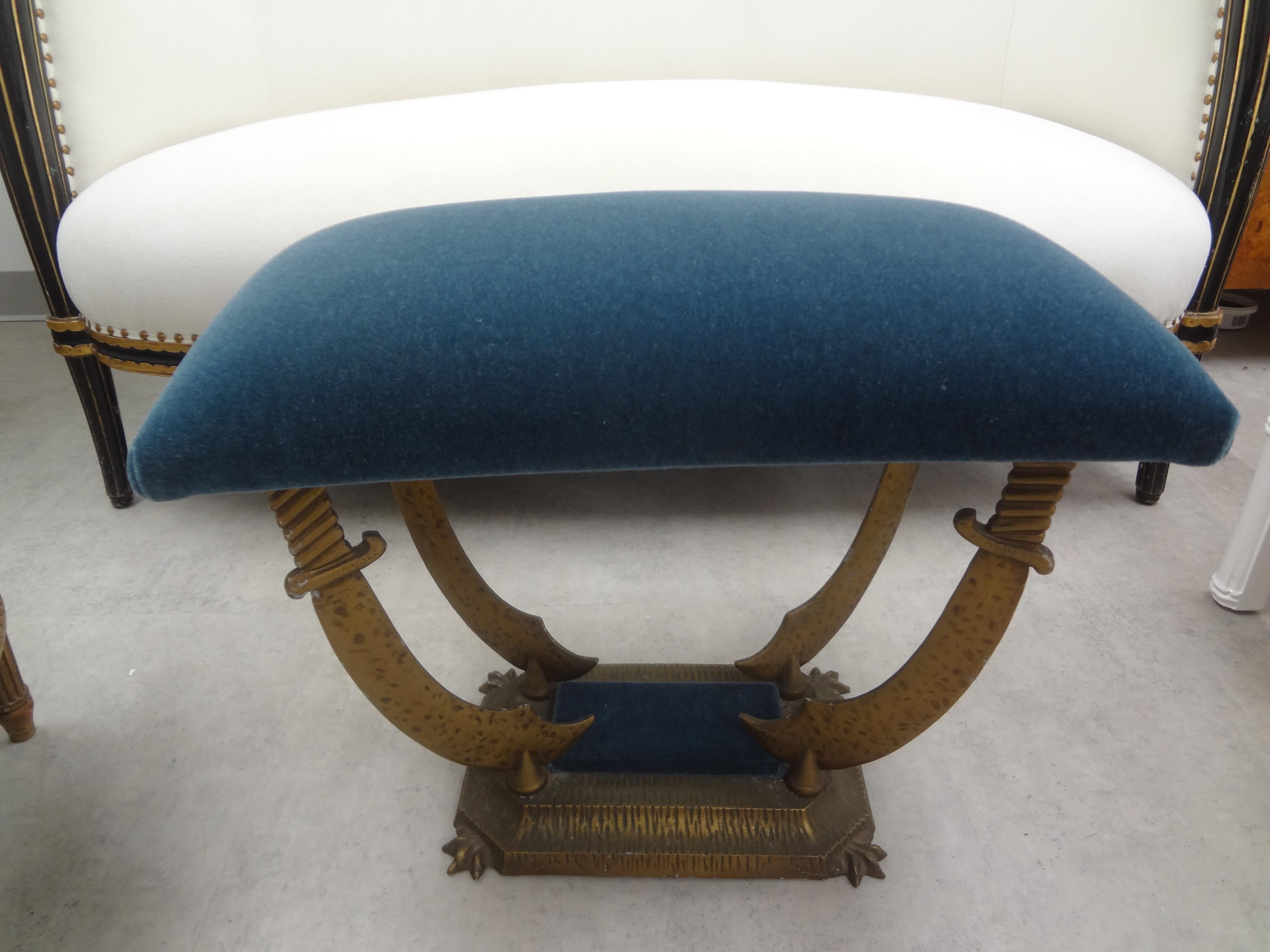 Hollywood Regency bronzed iron saber or sword bench. This charming vintage bench, stool or ottoman has been newly upholstered in push blue mohair fabric.