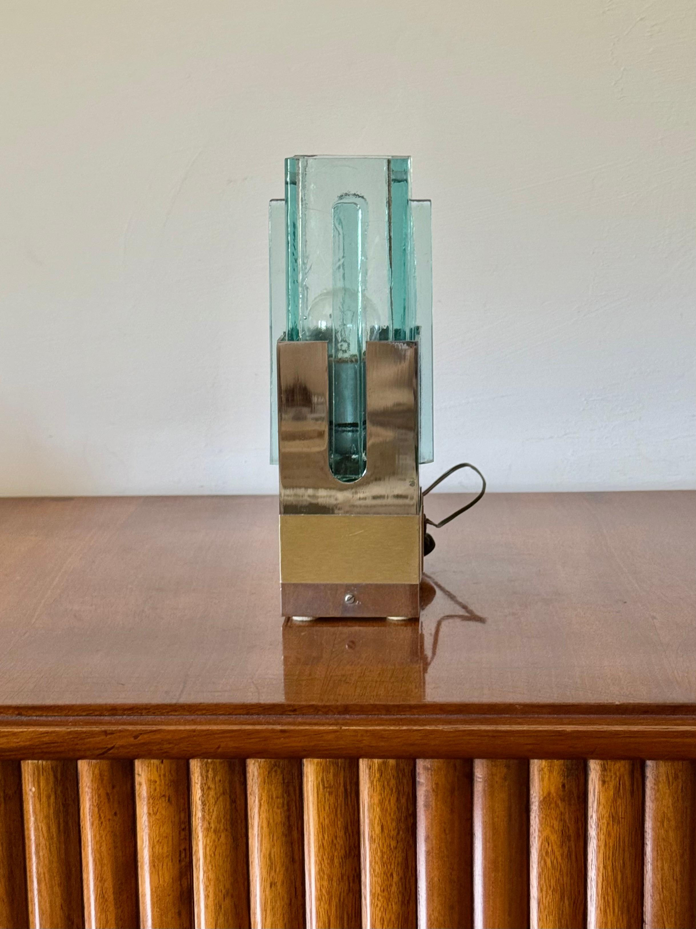 Hollywood regency table lamp

Gaetano Sciolari Italy 1970s

Chromed metal, green molded glass

H 24 × 10 cm diam.

Conditions: excellent consistent with age and use