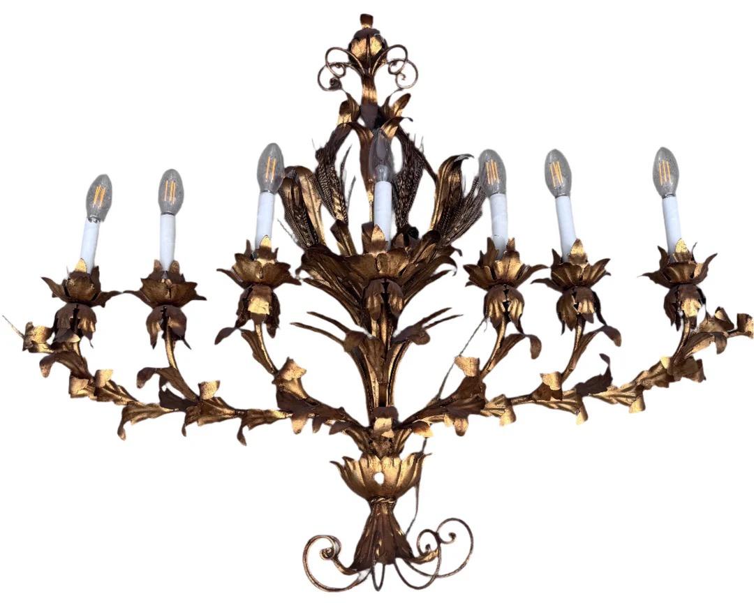Lámpara de pared Tole 7 luces Vintage Hollywood Regency

Preciosa lámpara apliques vintage, un candelabro tole, con capacidad para siete bombillas del tamaño de una vela. 

Mediados del siglo XX 

Dimensiones

W 42