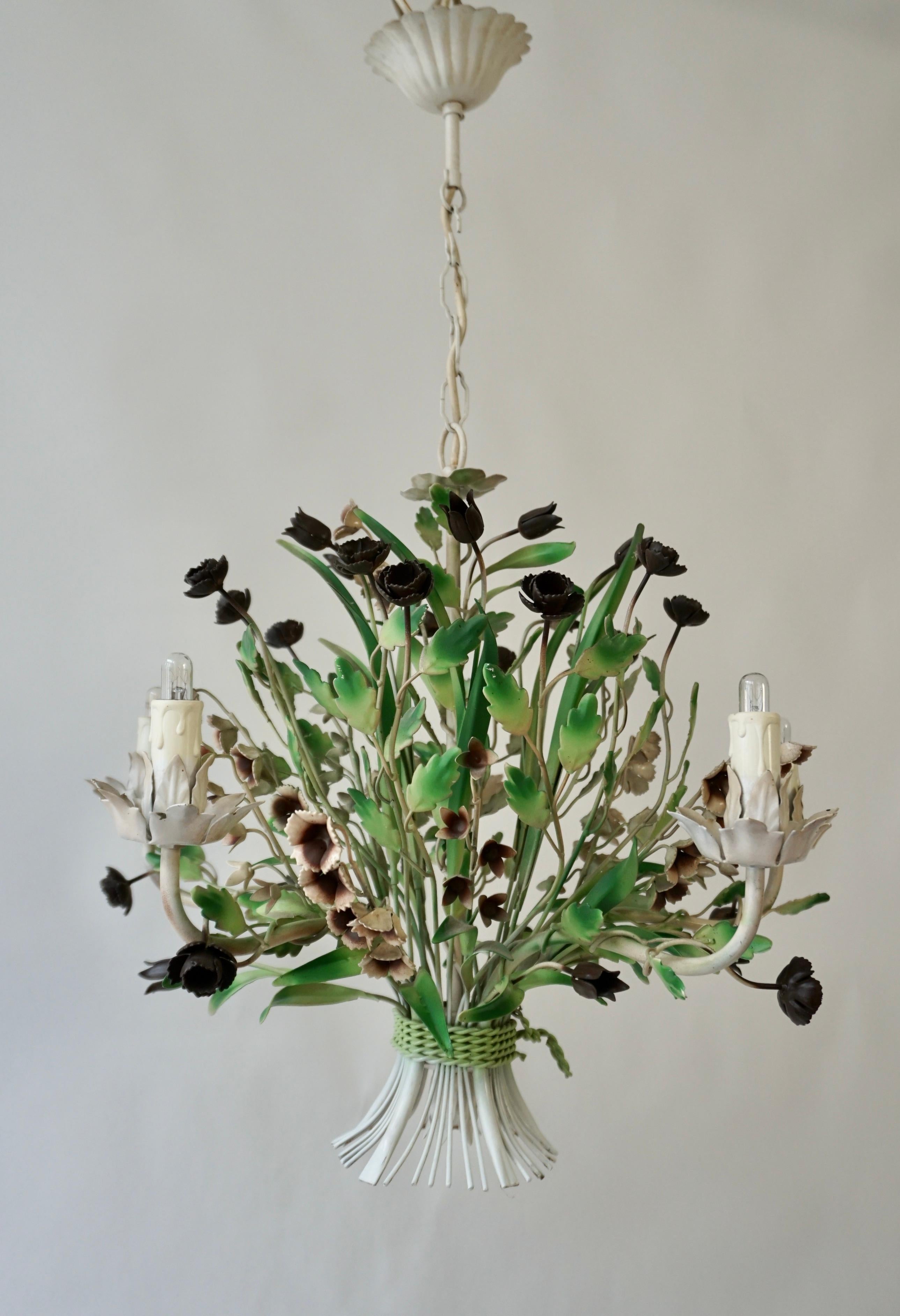 A vintage tole five-light chandelier with flower and leaf accents. Original paint finish in vibrant greens, white, and different shades of brown.

Diameter 21.6