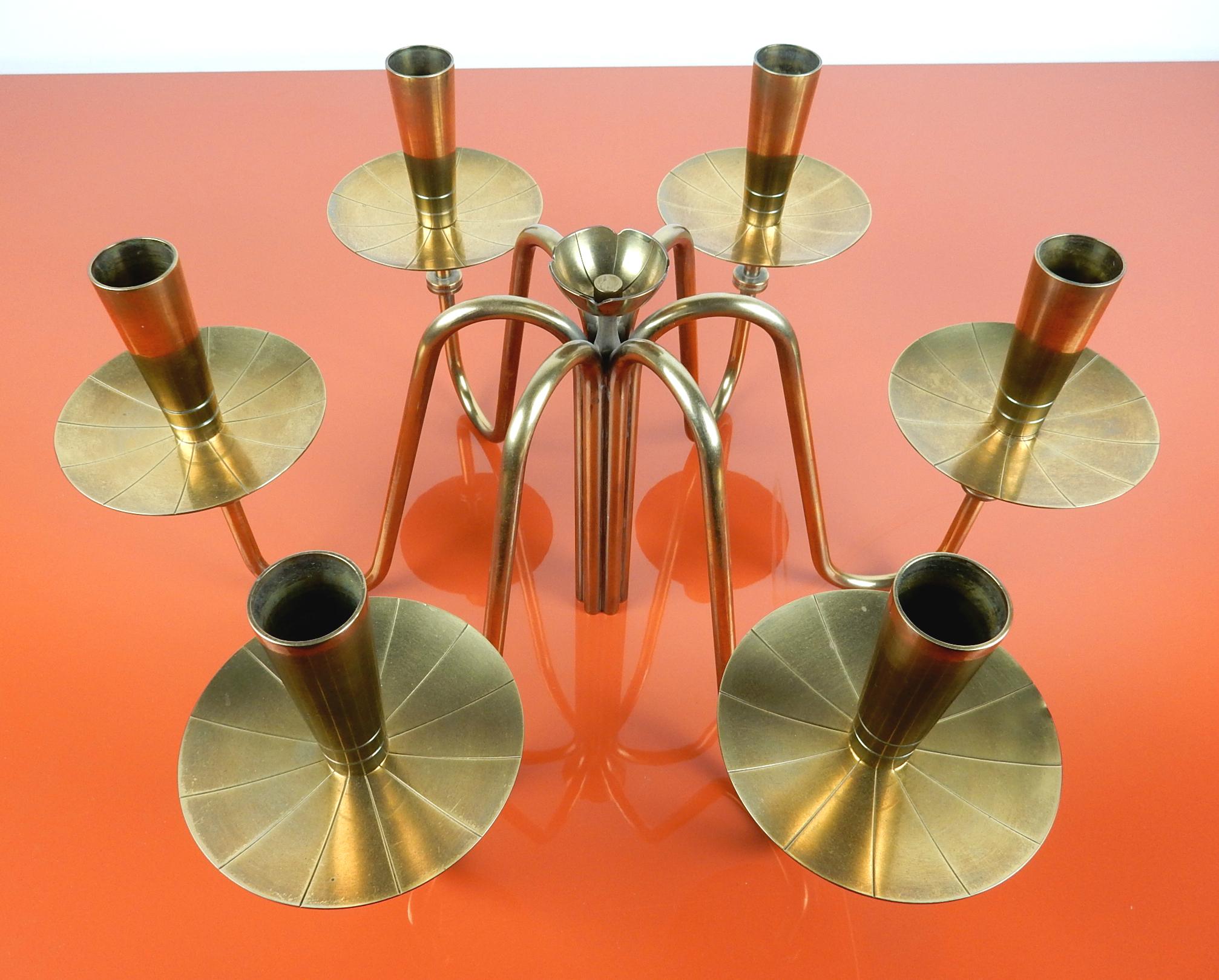 Amazing organic lotus candelabra centerpiece designed by Tommi Parzinger.
Made of solid brass with warm aged patina. 