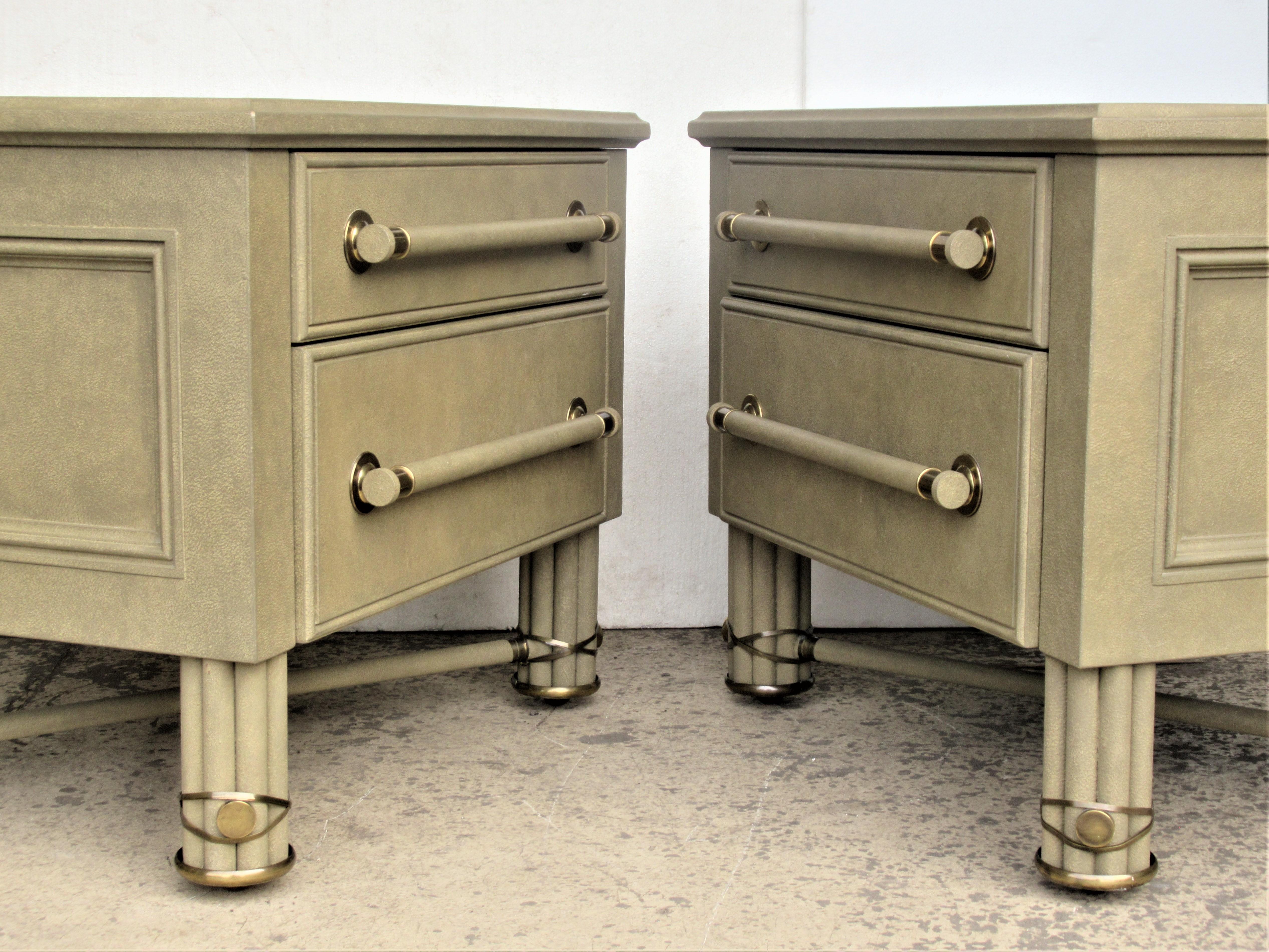 Pair of  two drawer low chests / side tables by Hart Associates in the original texture painted factory finish with great looking brass wrapped legs and hardware. Style of Tommi Parzinger, circa 1970s. Look at all pictures and read condition report
