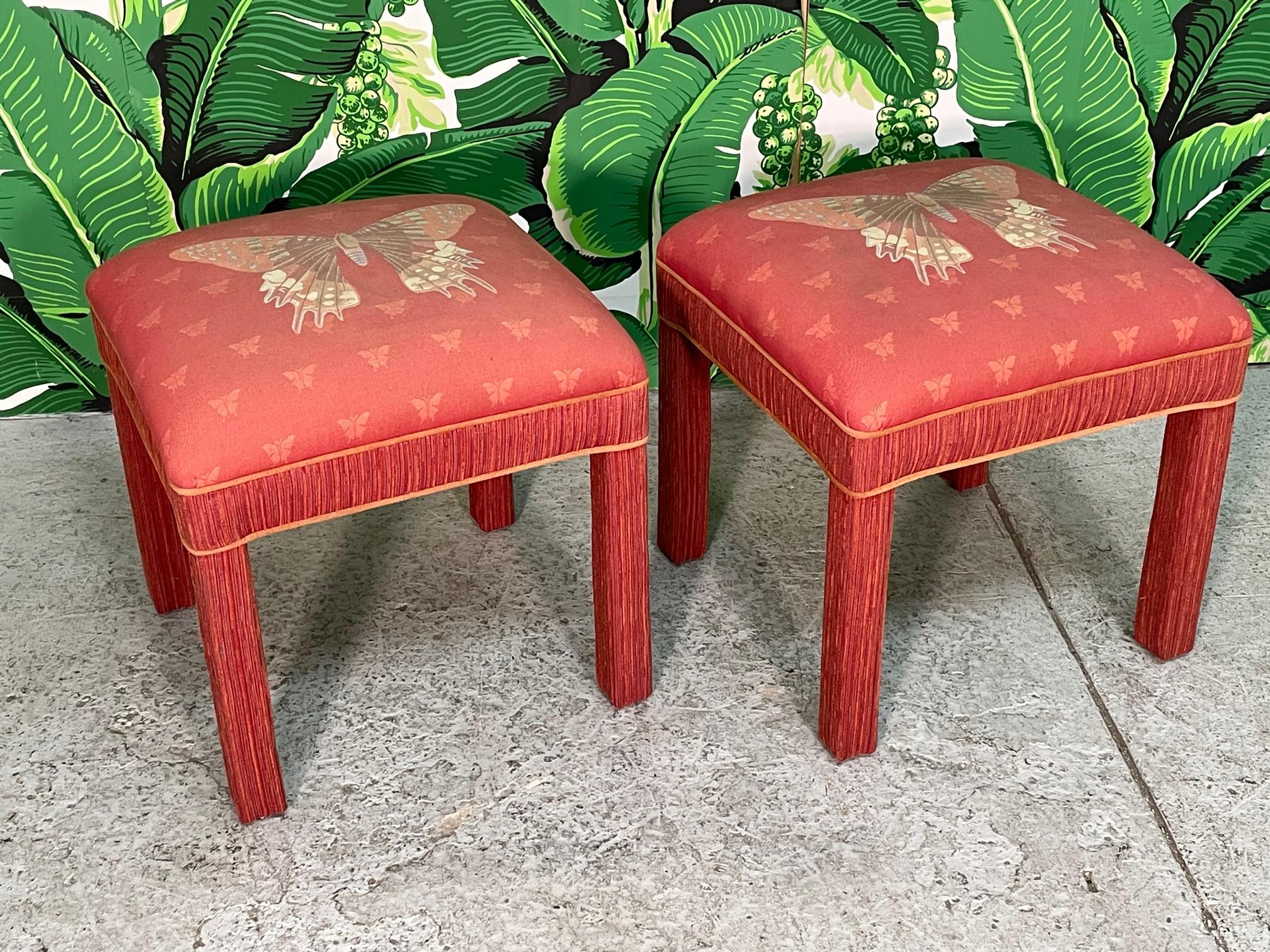 Pair of mid century fully upholstered foot stools embellished with a large embroidered butterfly. Could be used as ottomans. Good condition with imperfections consistent with age, some small pen marks on one rear corner (see photos). 
For a shipping