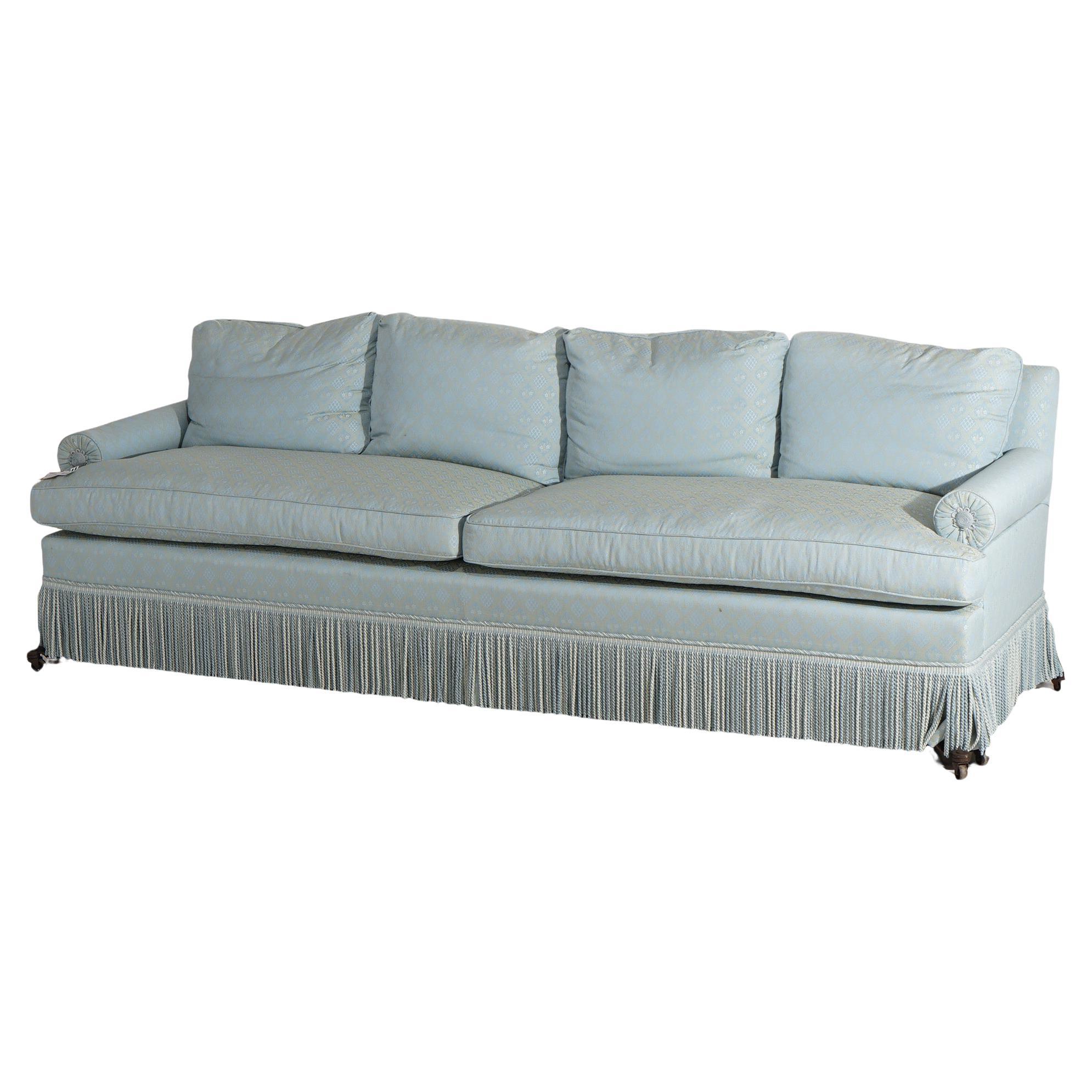 Hollywood Regency Upholstered Pillow Back Long Sofa with Fringe Skirt 20thC For Sale