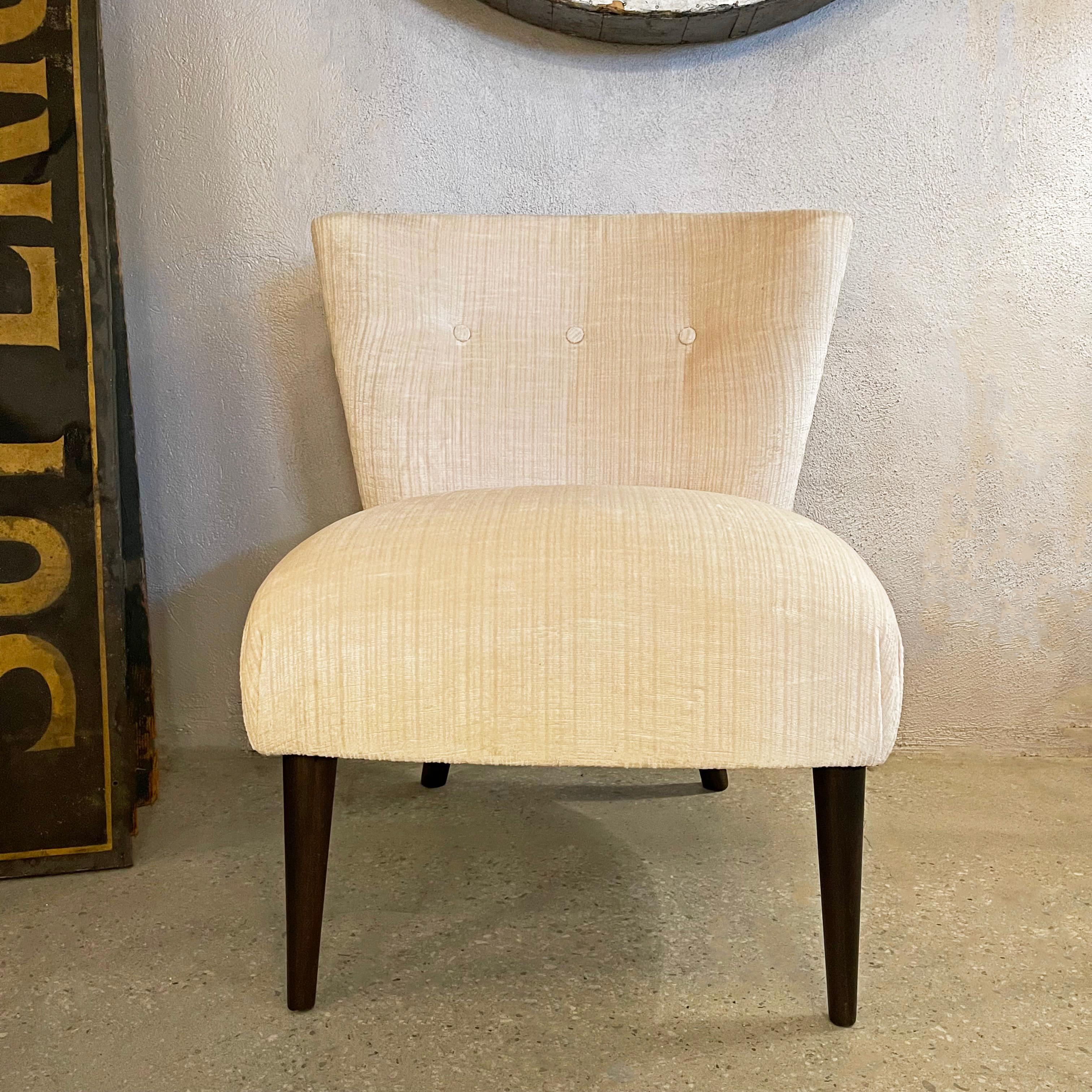 Midcentury, Hollywood regency, slipper chair by Kroehler upholstered in textured, cream velvet with lacquered rosewood legs.