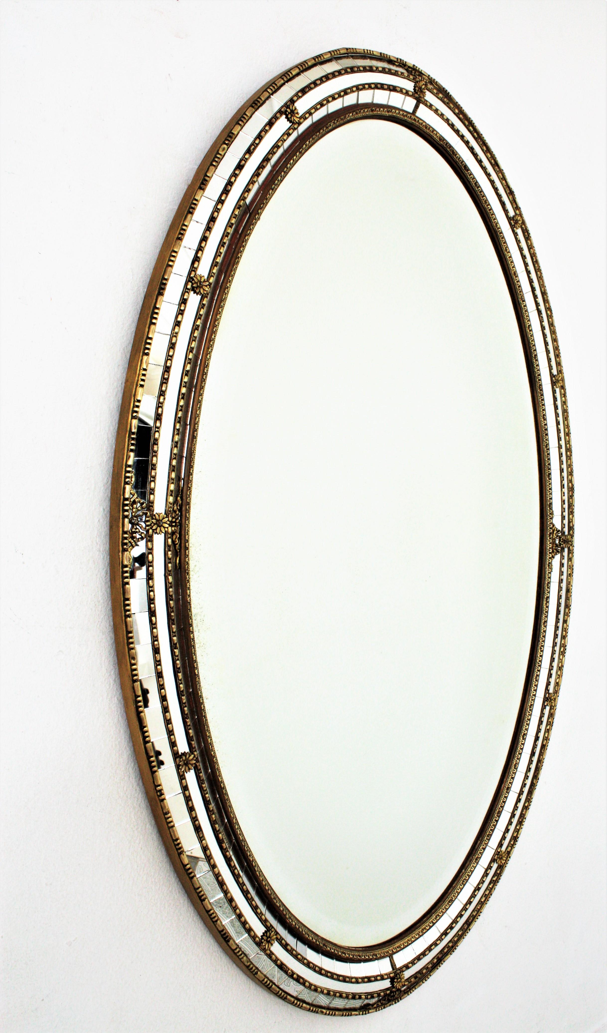 Hollywood Regency Venetian Style Oval Mirror with Beveled Glass and Brass Accents, 1950s