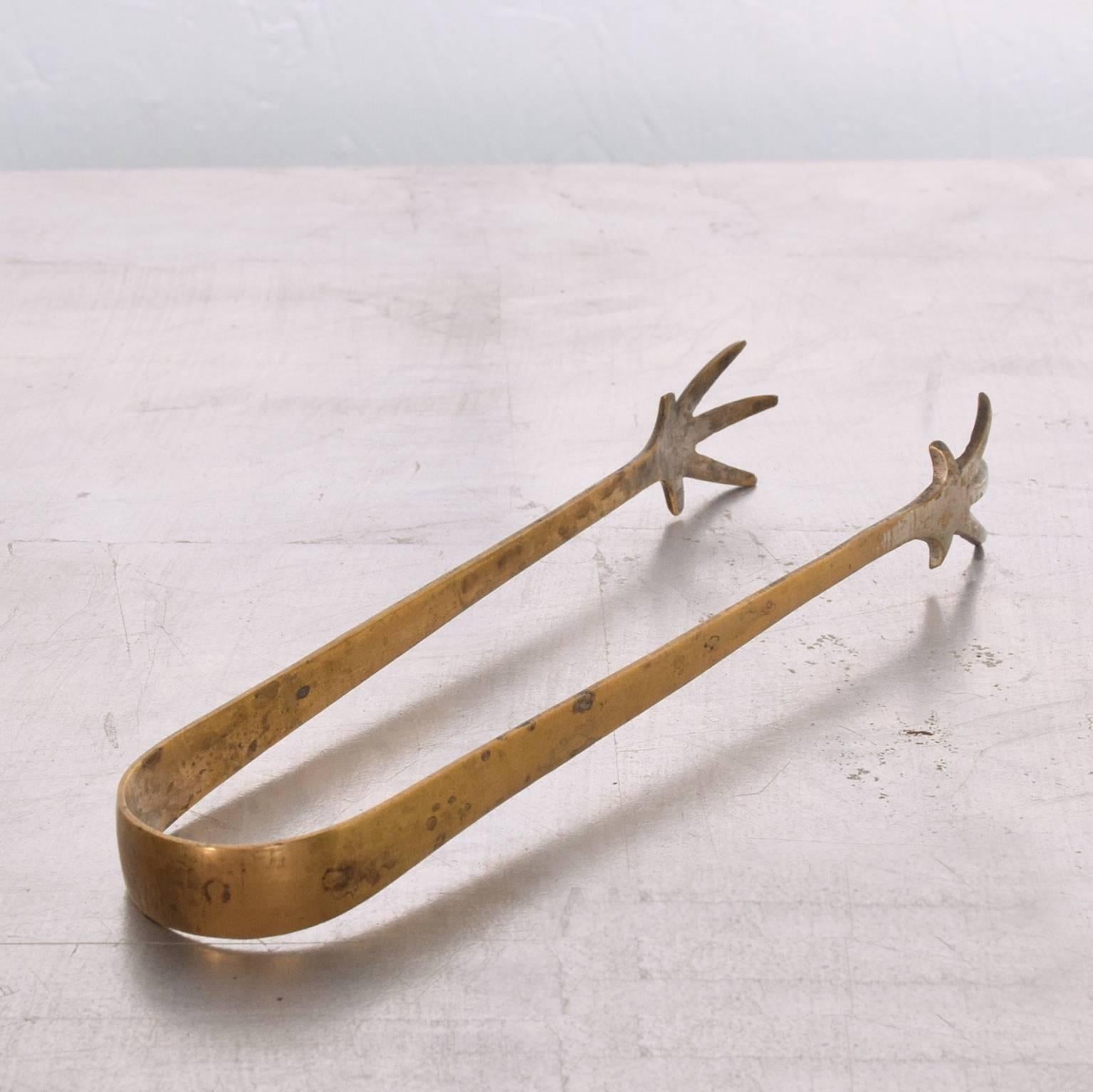 For your consideration a vintage solid brass ice tongs.
circa 1960s.
Dimensions 5.5