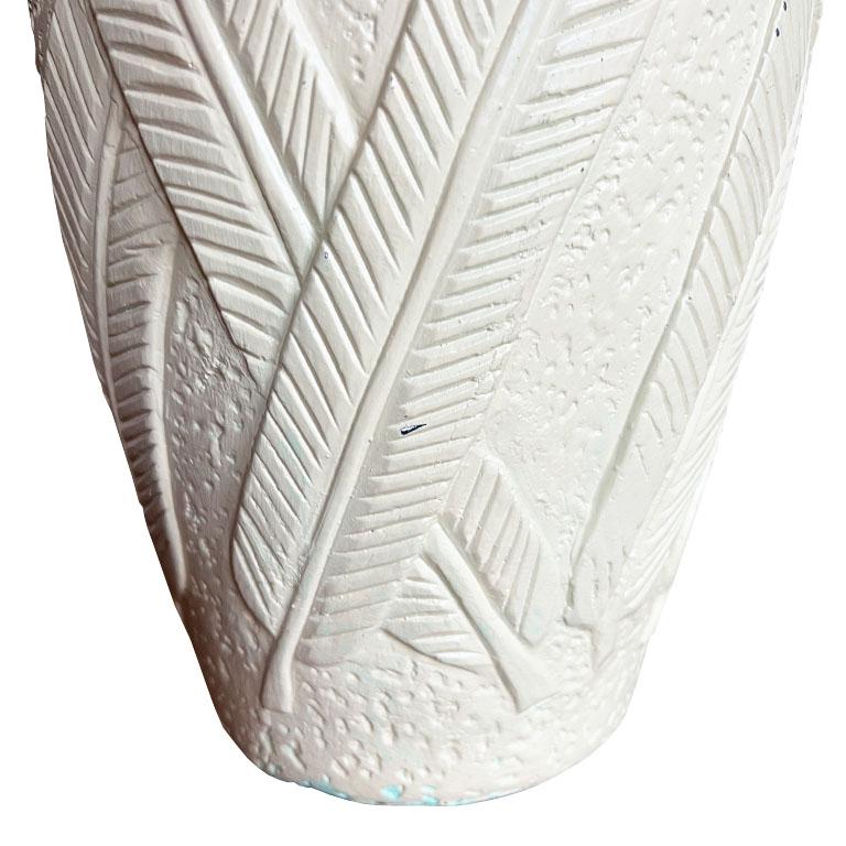 This stunning mid-century modern or Hollywood Regency ceramic table lamp showcases a beautifully textured surface with an intricate palm leaf or banana leaf relief pattern. The organic design brings nature-inspired elegance to your space, while the