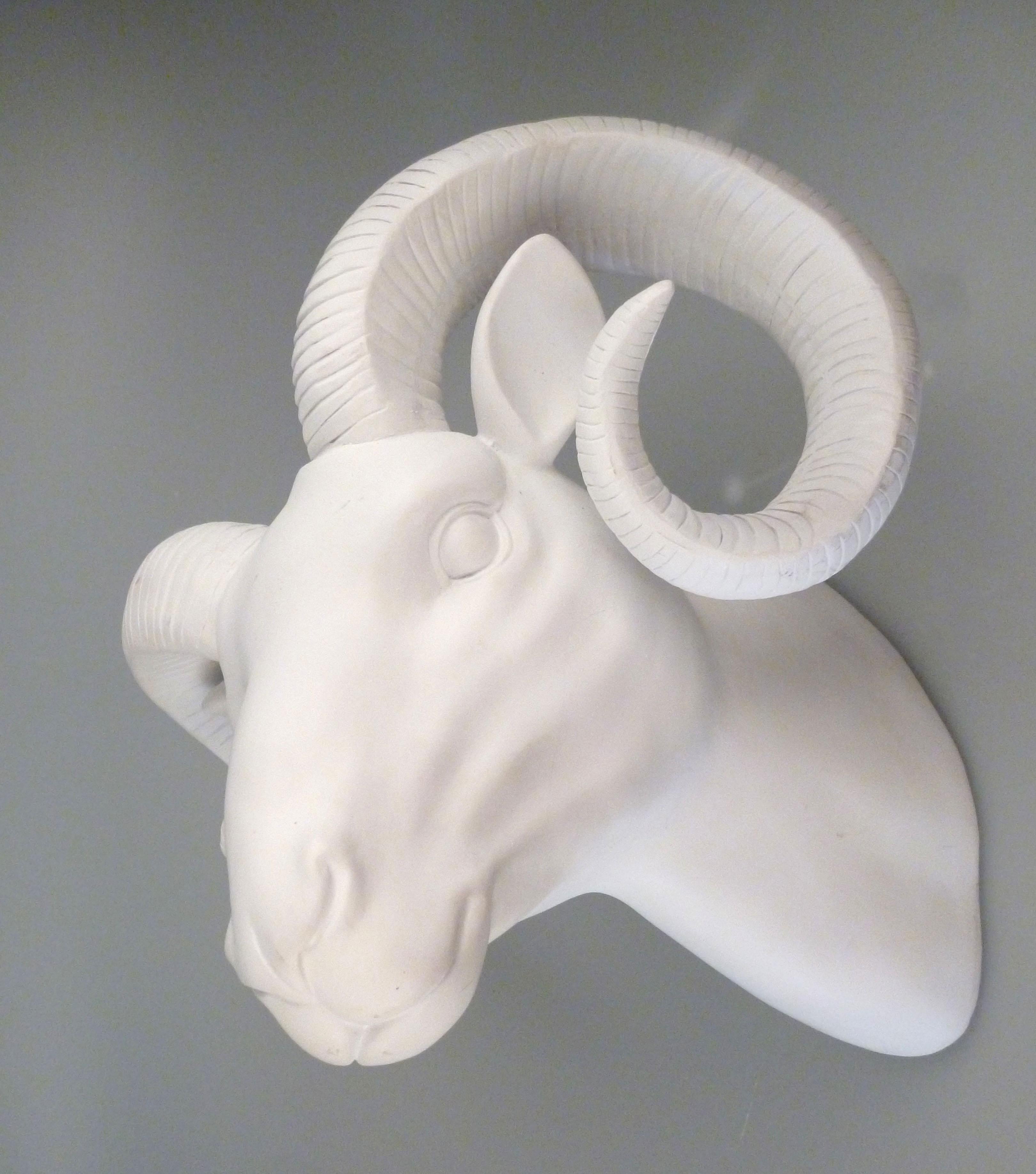 Hollywood Regency white plaster ram's head sculpture, wall art.
The backing has a secure construction to mount it to the wall.