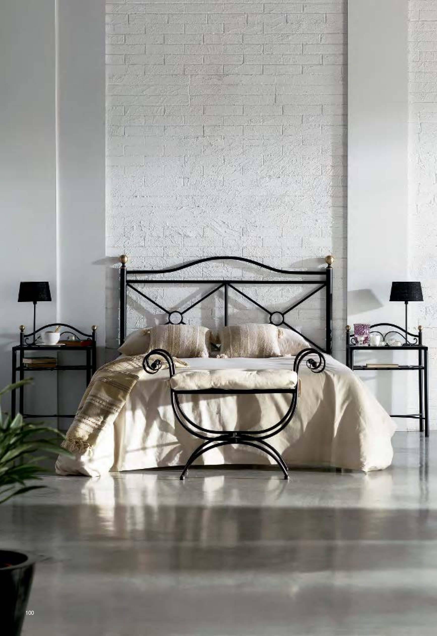 Stylish wrought iron Curule bench made in the neoclassical taste. Featuring an X-form design with scrolled arms and feet. These bench are also known as Dante chairs, Savonarola chairs, and throne benches. The wrought iron has a tough patinated metal
