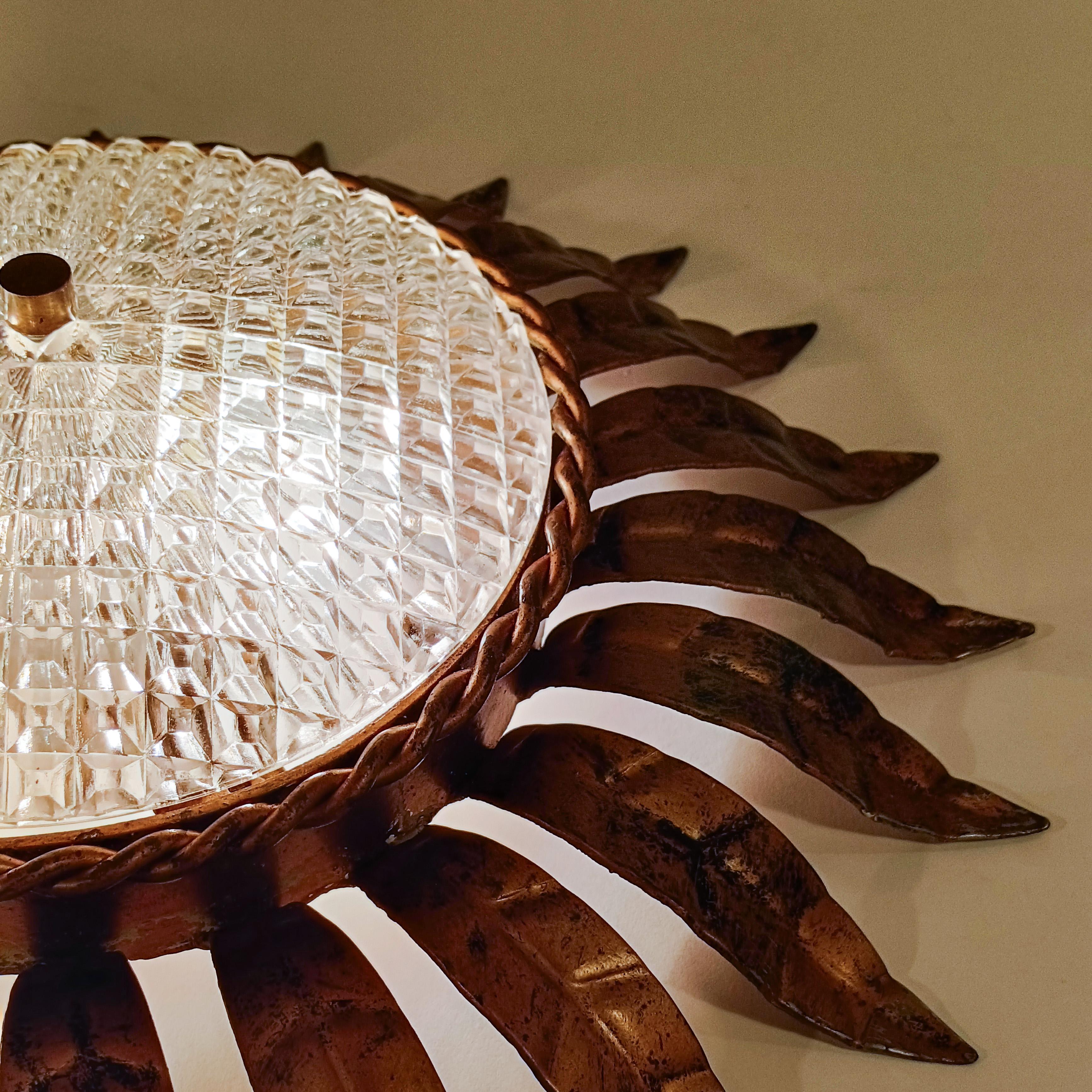 Hollywood Regency. Wrought iron Sunburst flush mount by Ferro Art, Spain, 1950s For Sale 2