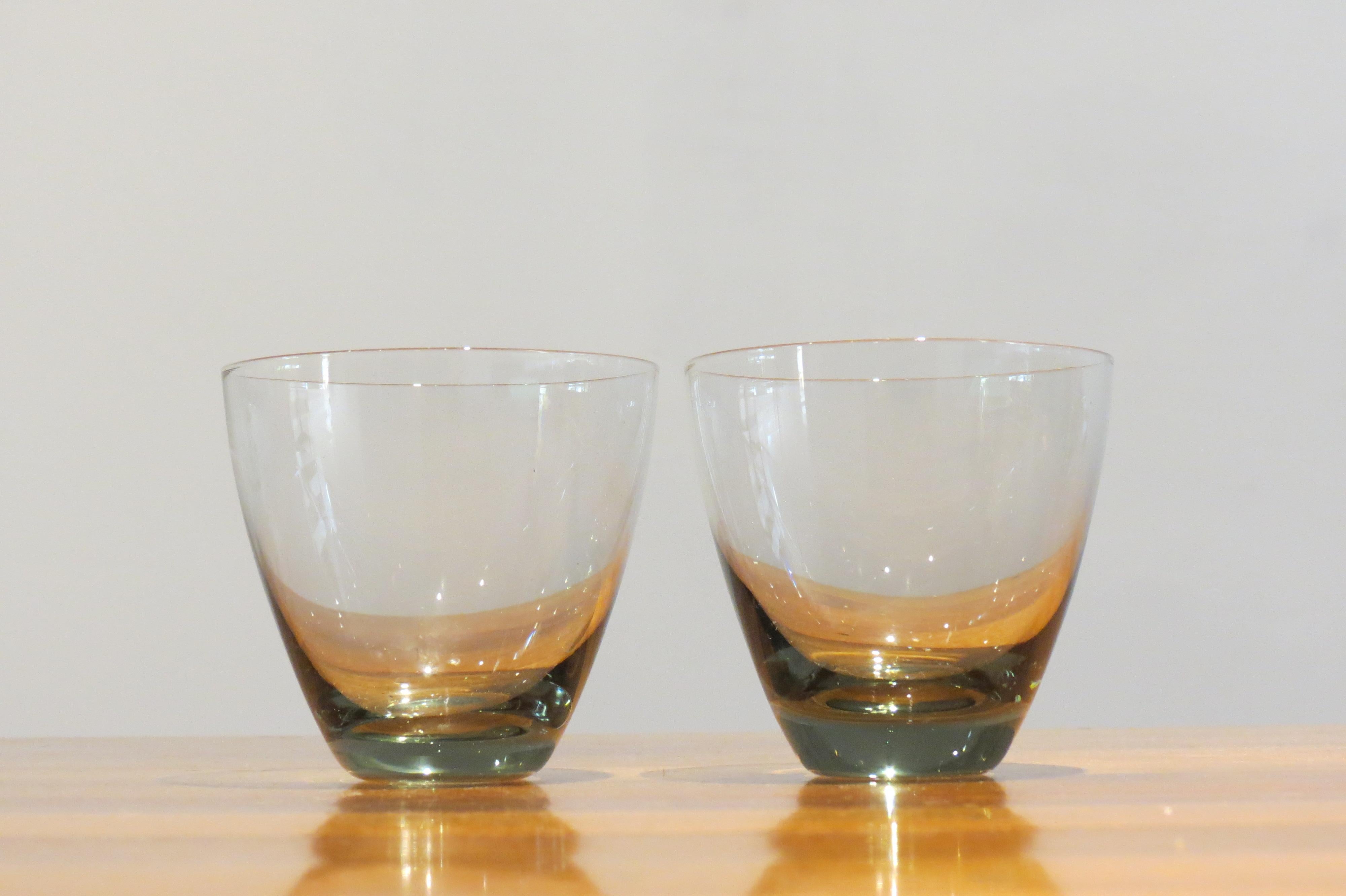 A set of two vintage Holmegaard, Denmark glasses.
Designed by Per Lutken, 1950s.
Smoked glass
Good condition
Measures: 7.5cm tall, 8cm diameter widest point
St931.
 