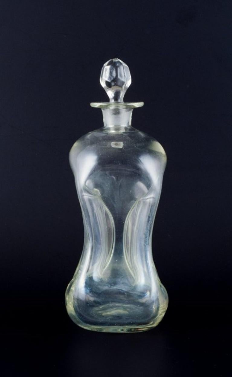 Danois Holmegaard, Danemark.  'Cluck Cluck'  carafes en verre clair soufflé à la bouche. en vente