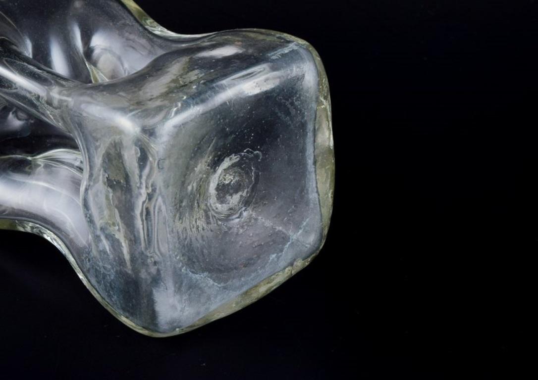 Verre d'art Holmegaard, Danemark.  'Cluck Cluck'  carafes en verre clair soufflé à la bouche. en vente