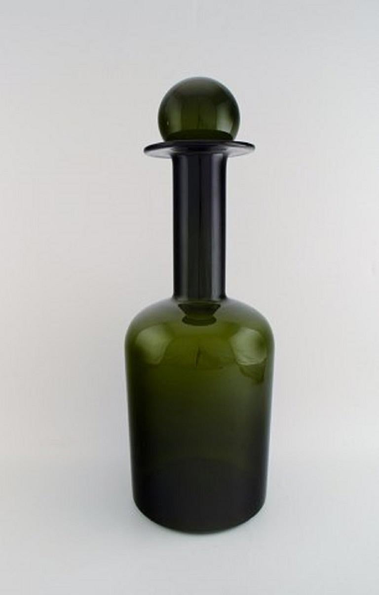 Holmegaard huge vase or bottle with lid in the shape of ball, Otto Brauer. Bottle green.
Measures: 51 cm. x 19 cm.
In perfect condition.