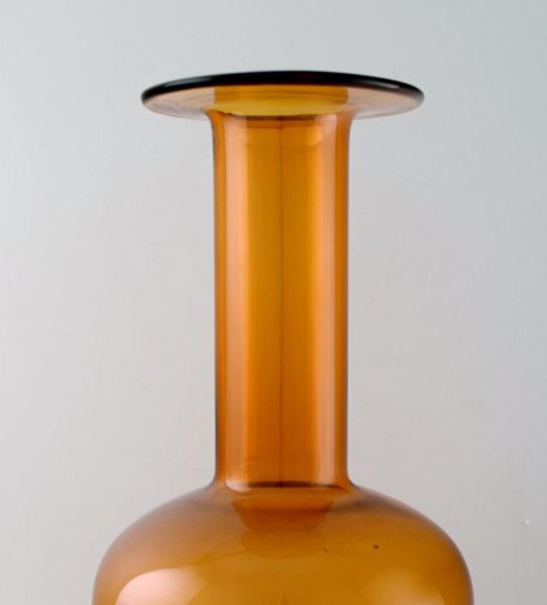 Holmegaard large bottle, Otto Brauer. Bottle in brown.
Measures: 38 cm.
In perfect condition.