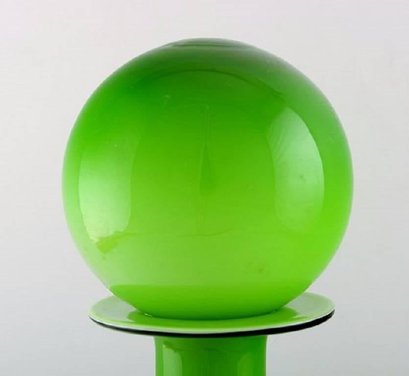 Danish Holmegaard Large Bottle, Otto Brauer. Spherical Stopper, Bottle in Light Green.